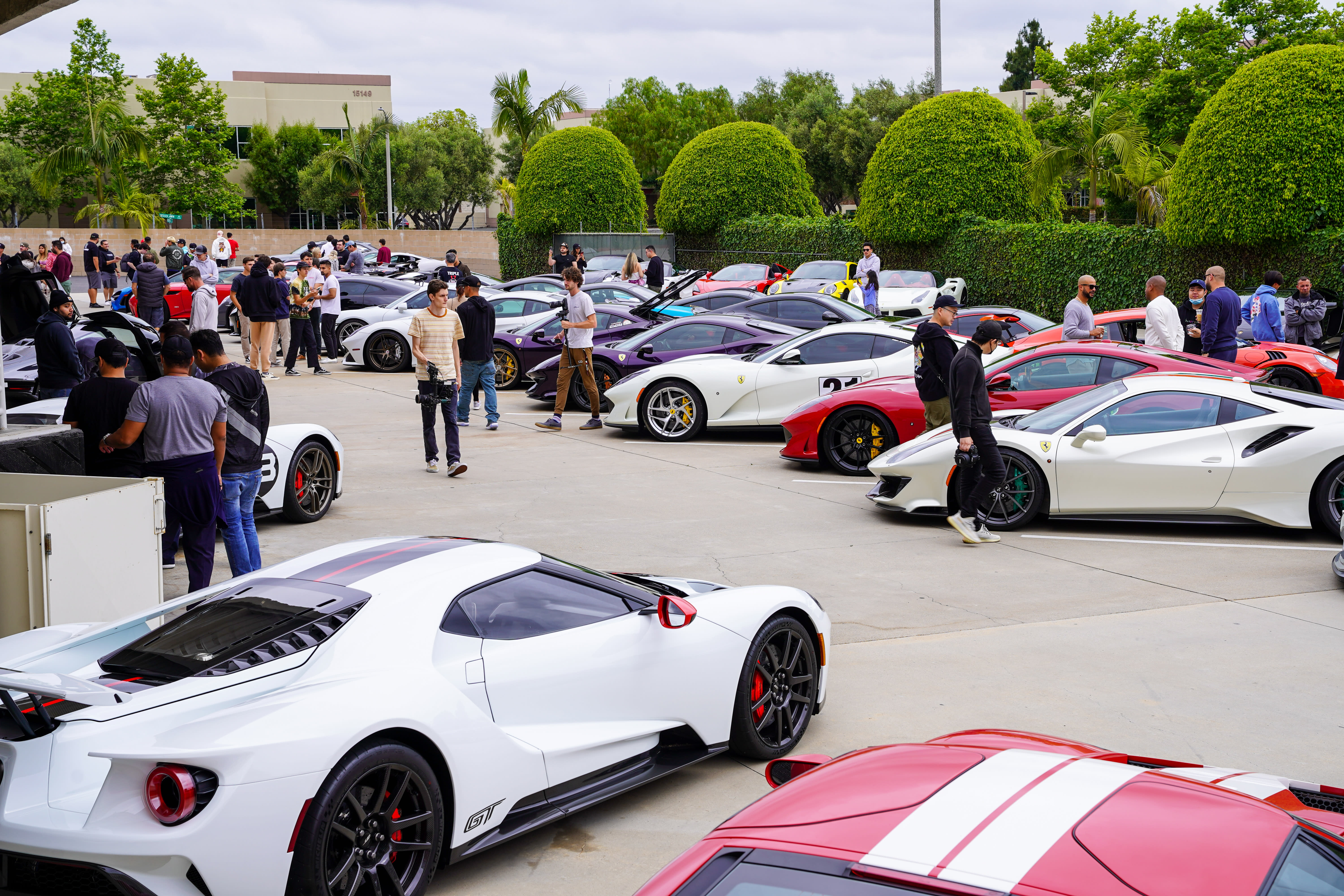 a collection of very high-end vehicles - mostly Ferraris - on display at the Marconi in Tustin.