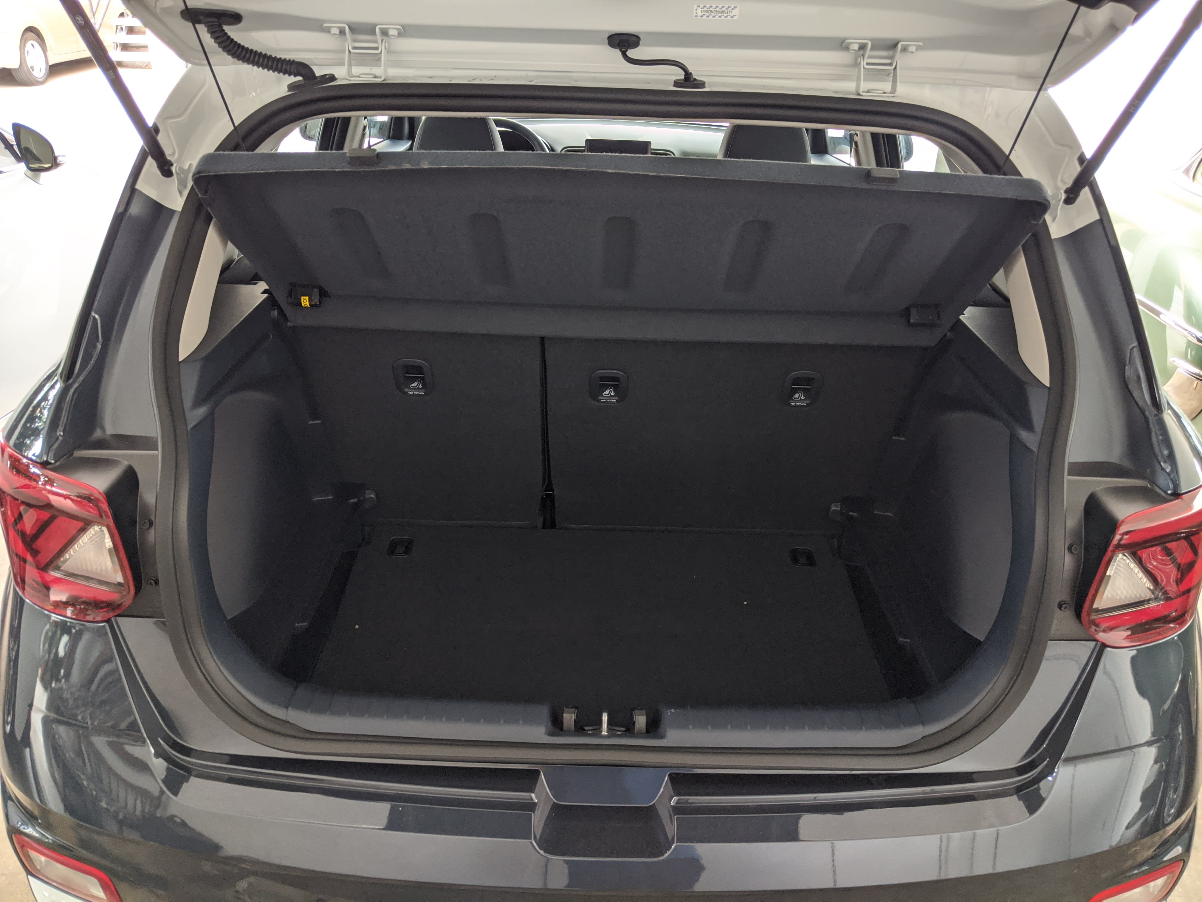 a photo of the trunk space of the 2021 Hyundai Venue showing the deep, yet not so wide, space available for your gear.