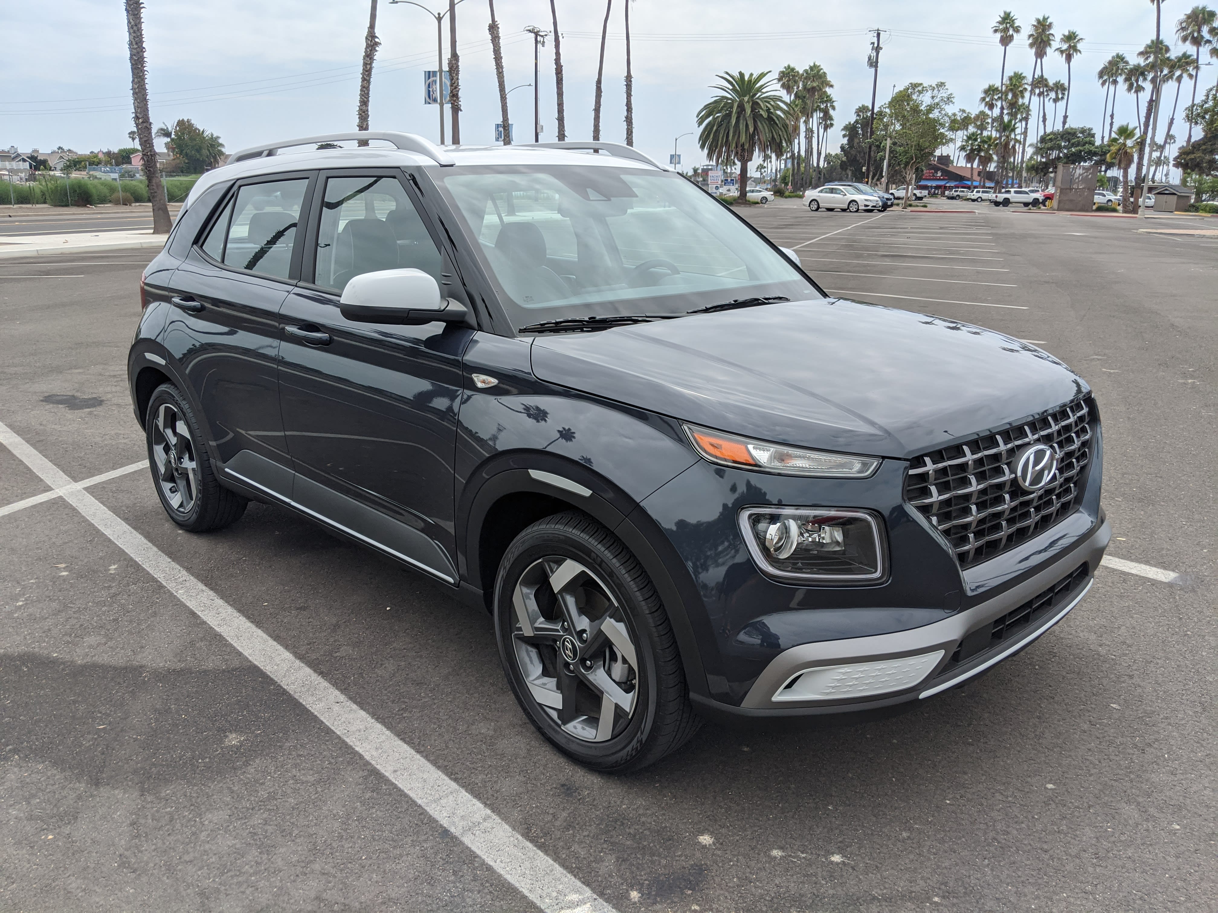 an image of the front and right side of the 2021 Hyundai Venue Denim on a parking lot in Southern California.