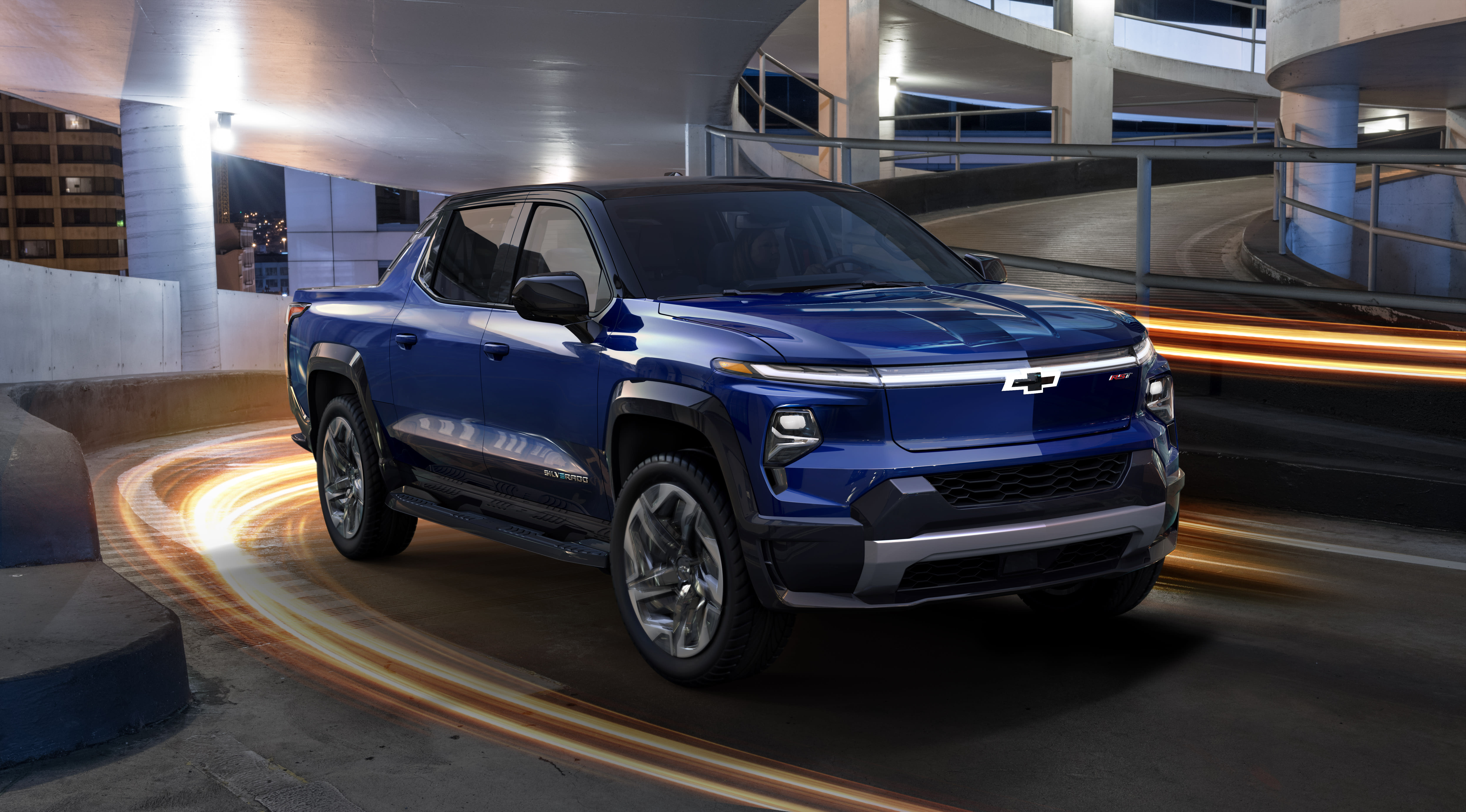 A blue 2024 Chevrolet Silverado EV