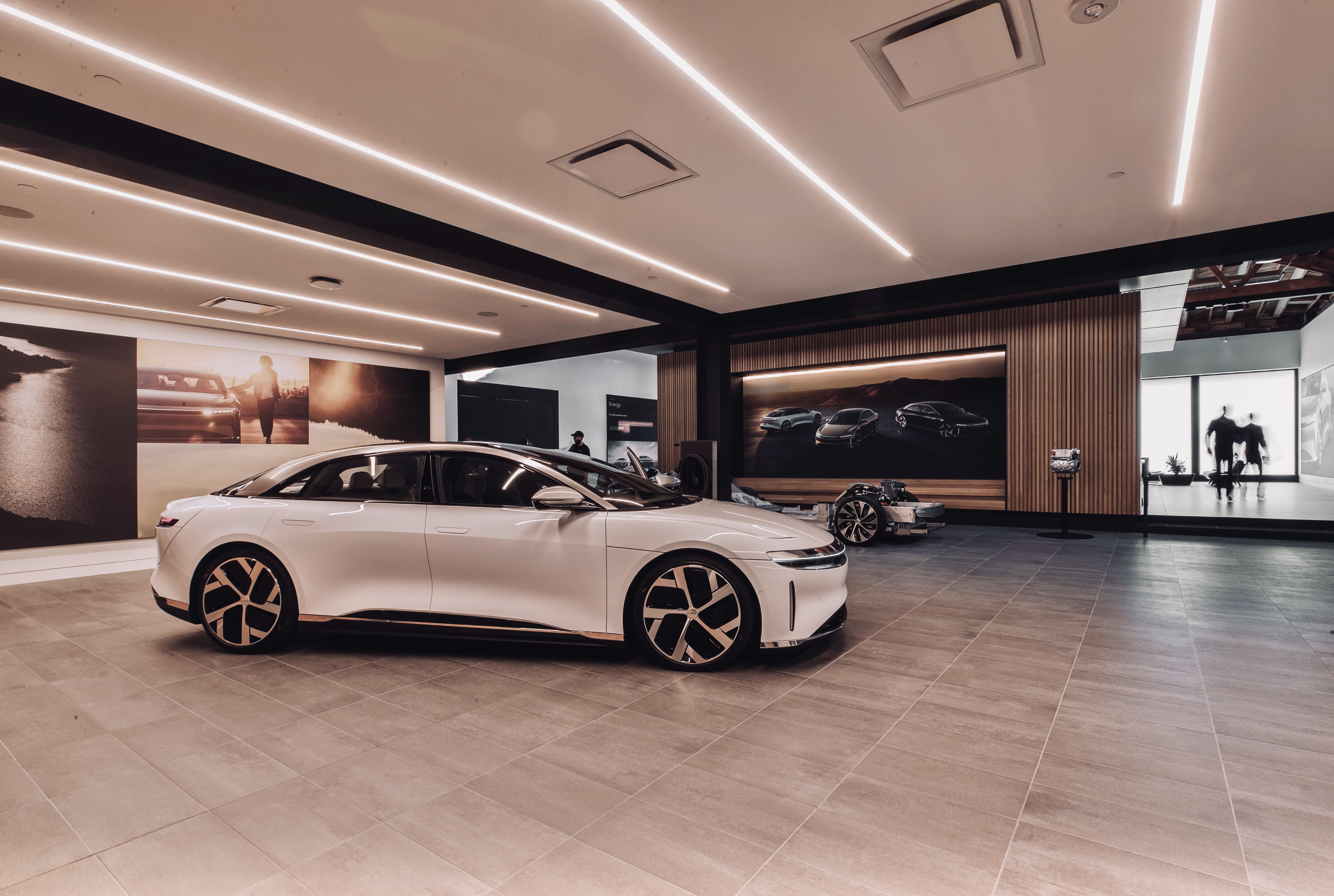 interior of the Lucid Showroom in Beverly Hills, displaying a white Lucid Air.