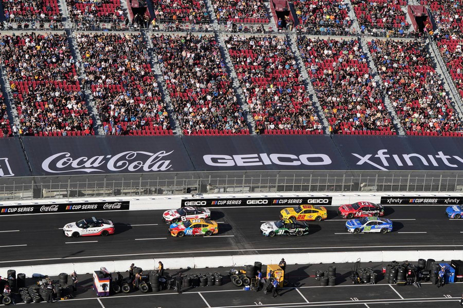 NASCAR vehicles going down the short straight during the Busch at the LA Coliseum 2022