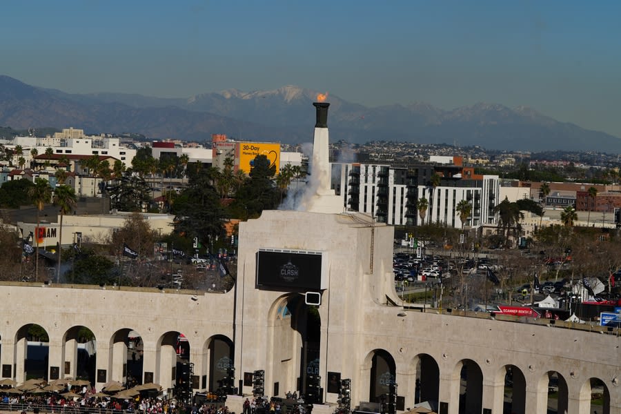 The LA Coliseum entrance with the mountains in the background.