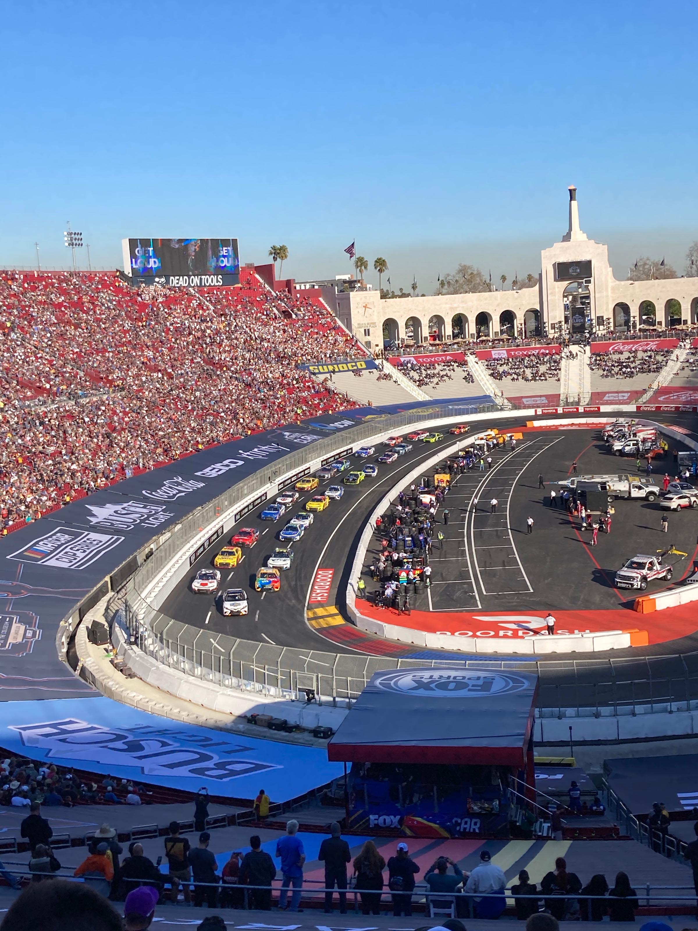 a view of the NASCAR races at the LA Coliseum from the bleachers