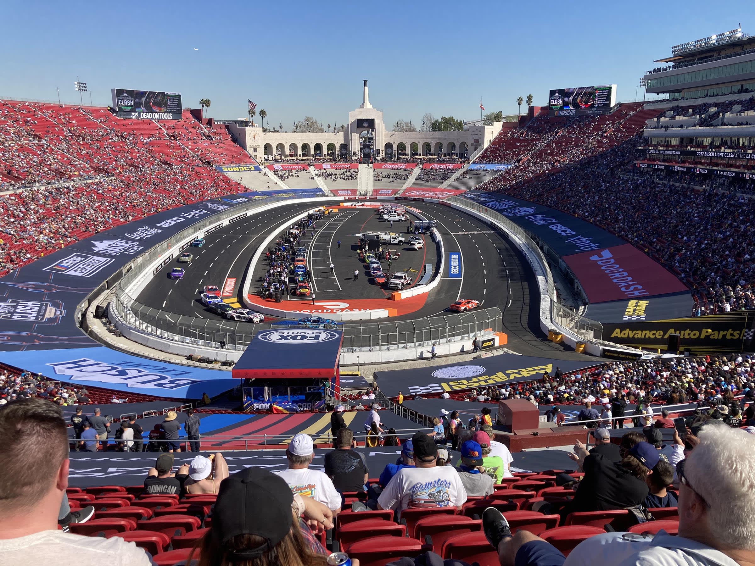 a view of the NASCAR races at the LA Coliseum from the bleachers