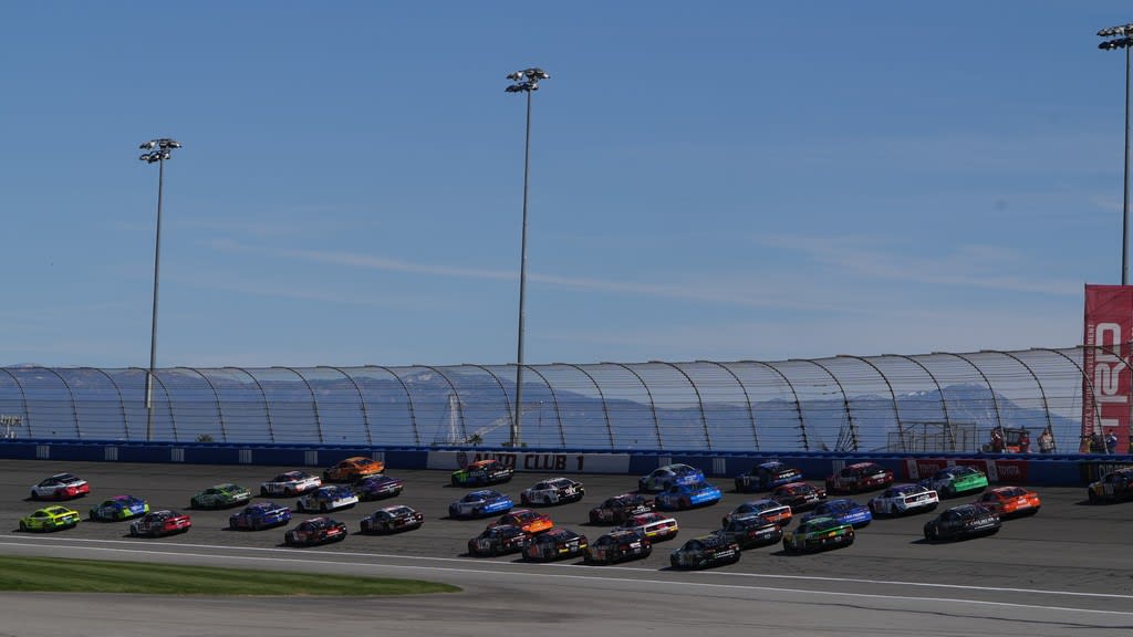 NASCAR racers on the track in Fontana