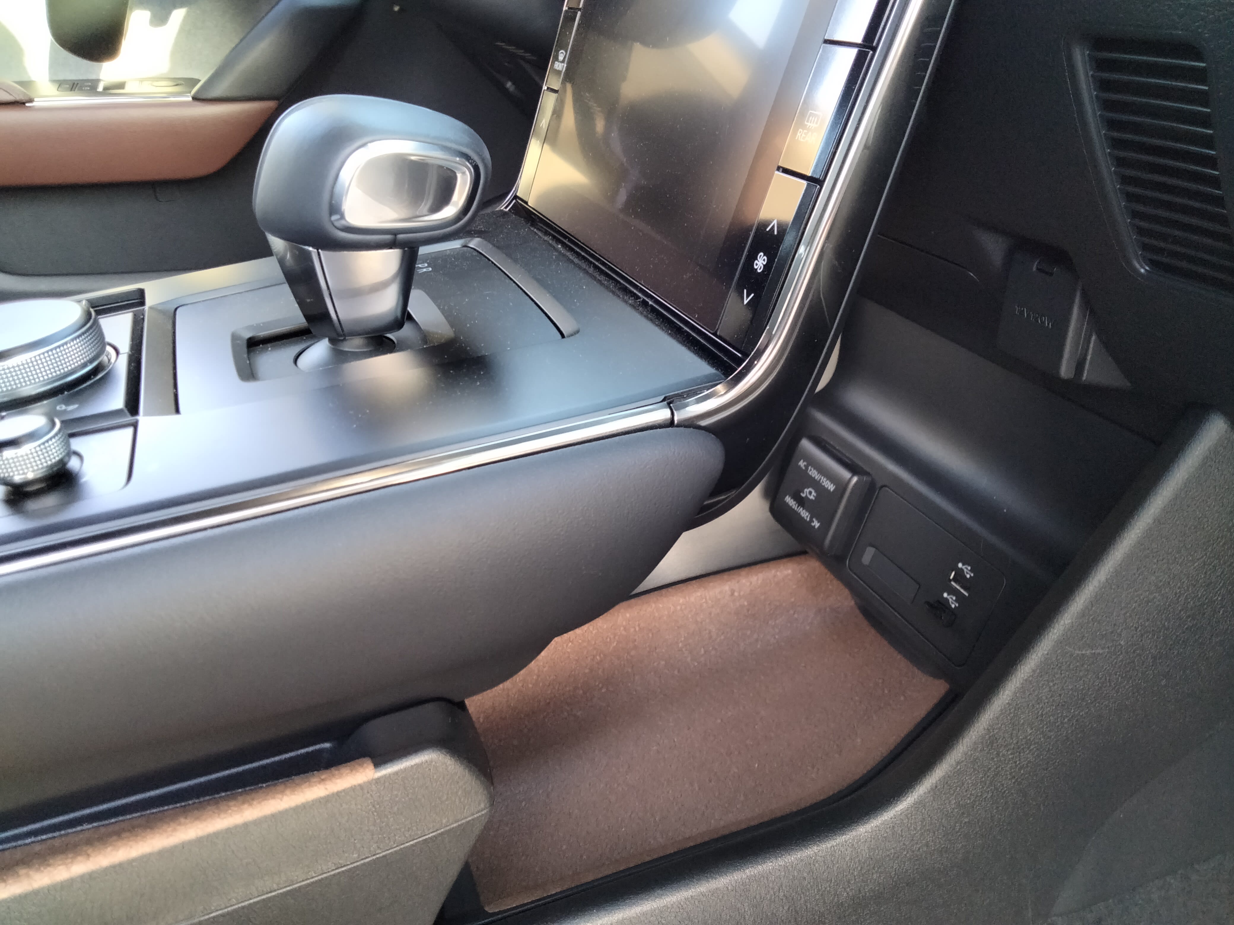 The infotainment screen and storage in the Mazda MX-30