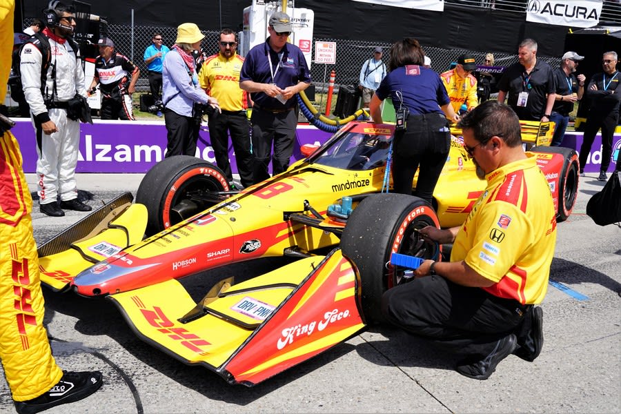a team Prepping Newgarden's car