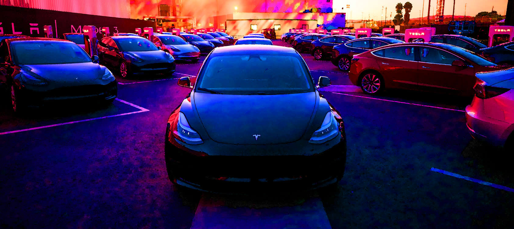 Lots of Tesla Model 3 vehicles awaiting delivery to customers.