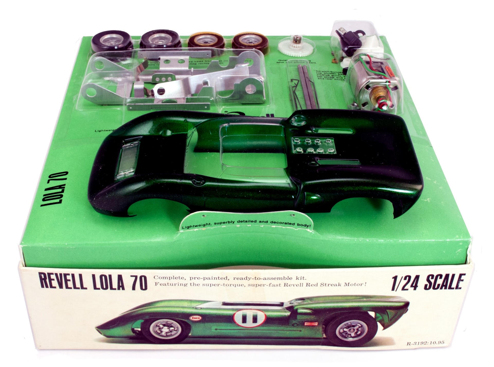 image of the product packaging for a slot car resembling the Lola 70