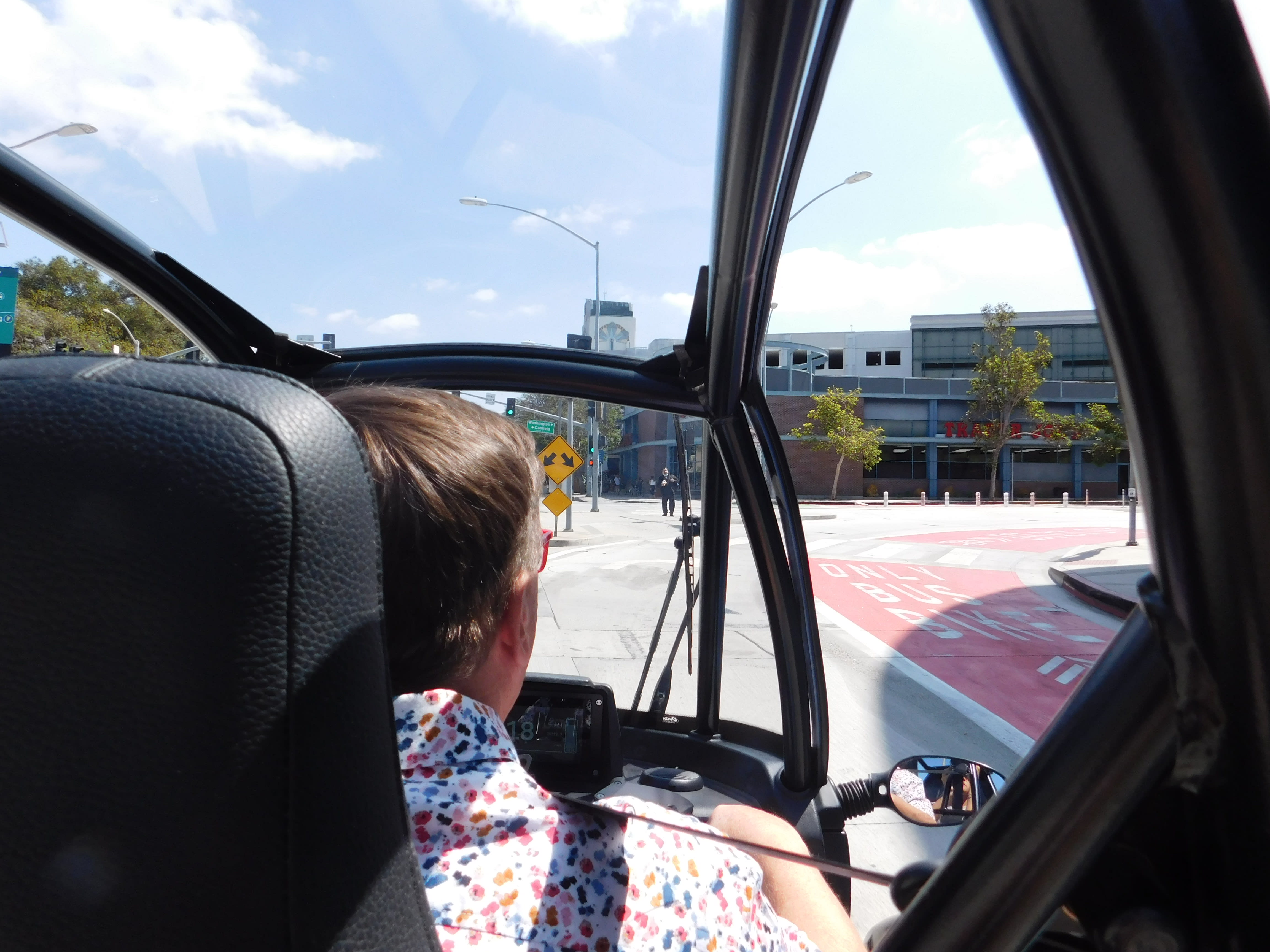 interior action shot of a driver in the Arcimoto FUV