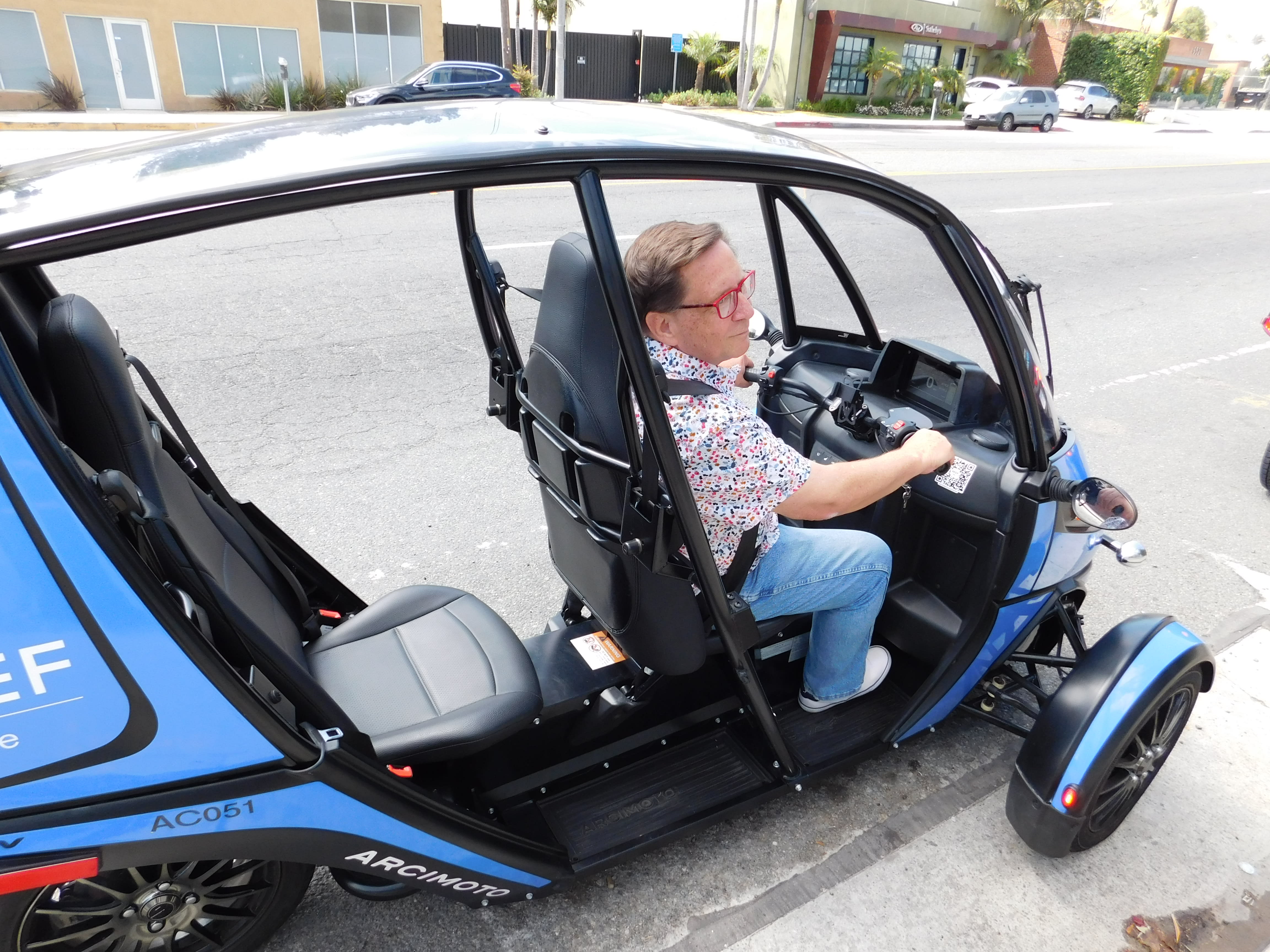 LACar contributor Reed Berry ready for his test drive in the Arcimoto FUV