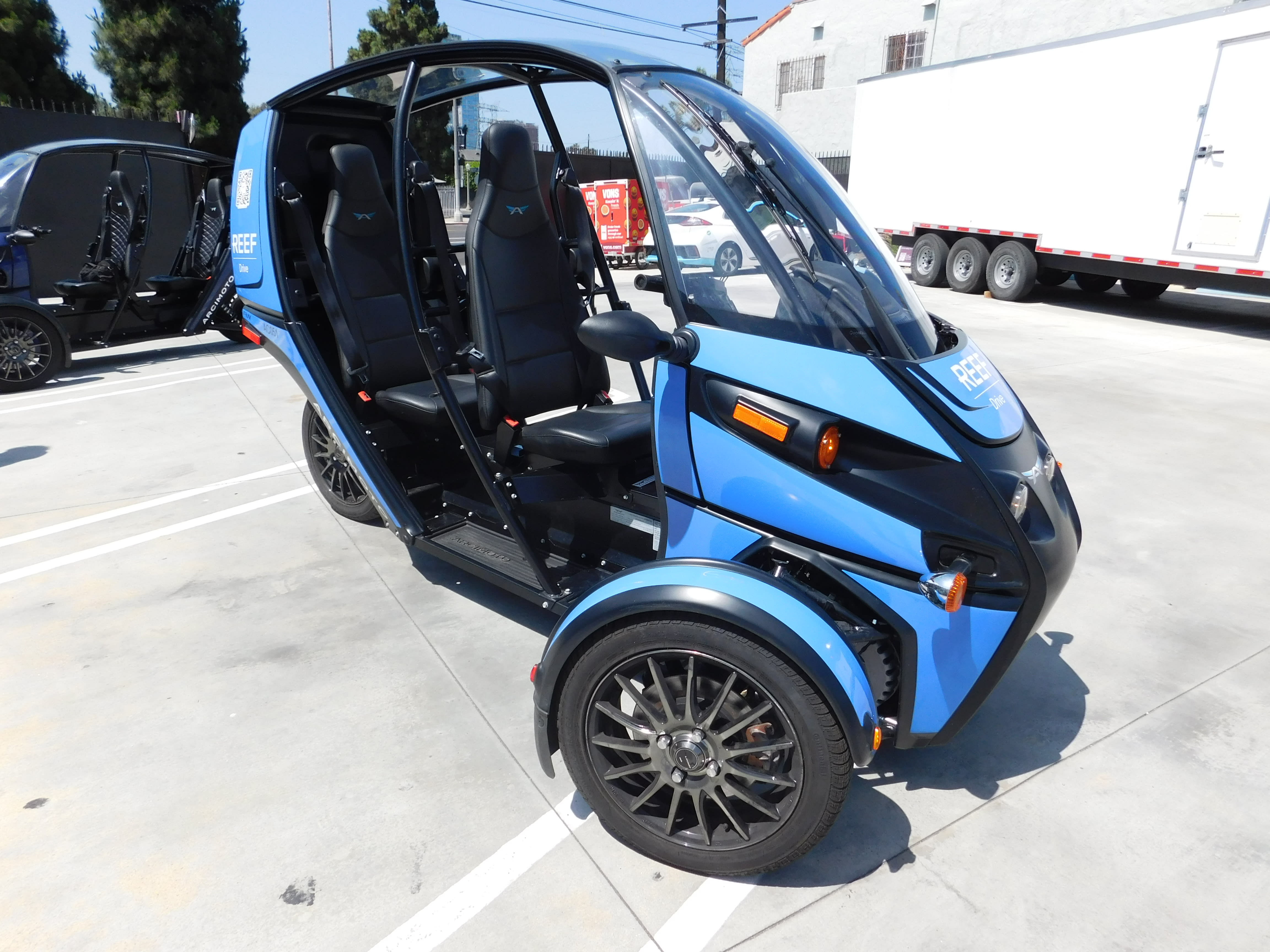 right side of the exterior and interior of the Arcimoto FUV