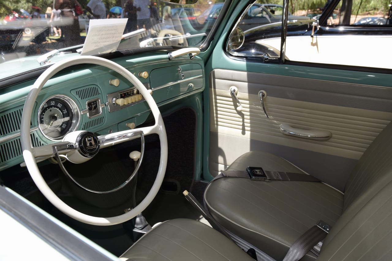 interior image of the turquois 1962 VW Beetle on display at San Marino Motor Classic