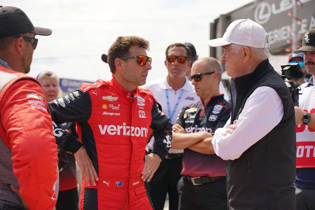 Will Power and Roger Penske talking at the finals at WeatherTech Laguna Seca