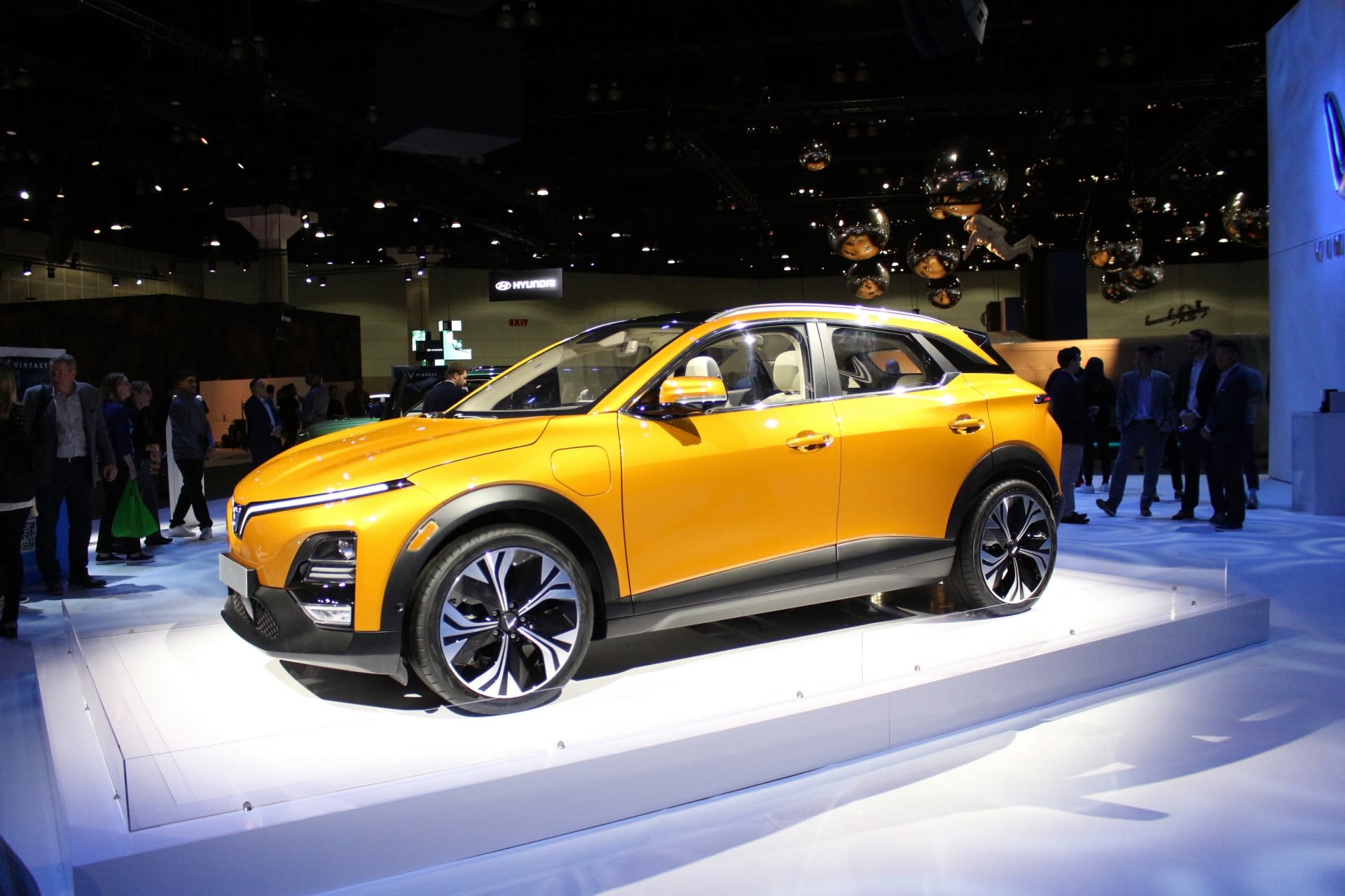 image of a very yellow Vinfast VF-5 on display at the 2022 Los Angeles Auto Show