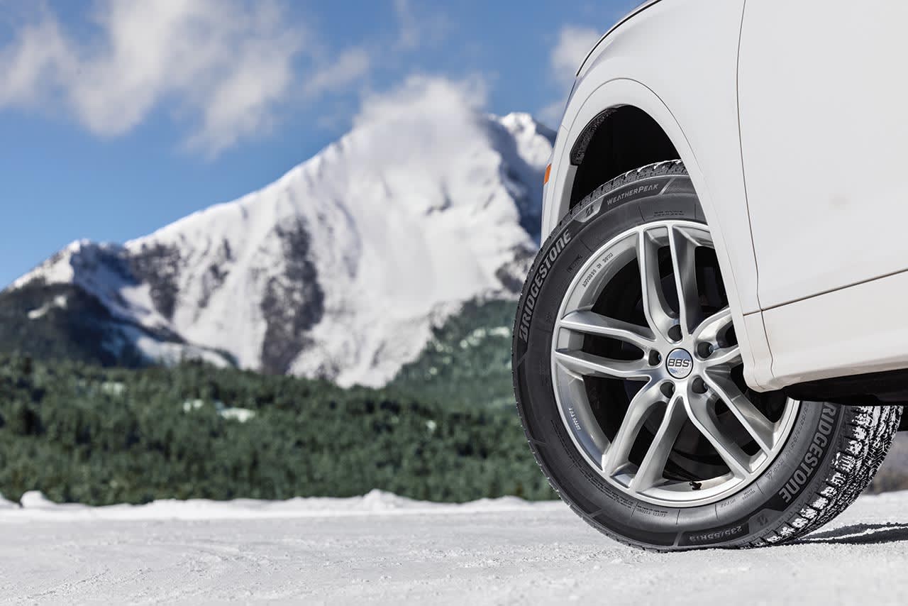 image of a car wearing the Bridgestone WeatherPeak tires