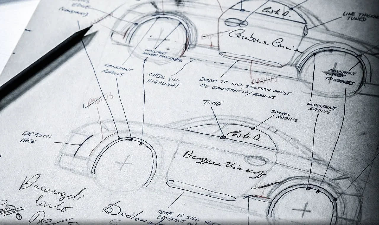 sketches of cars on a paper