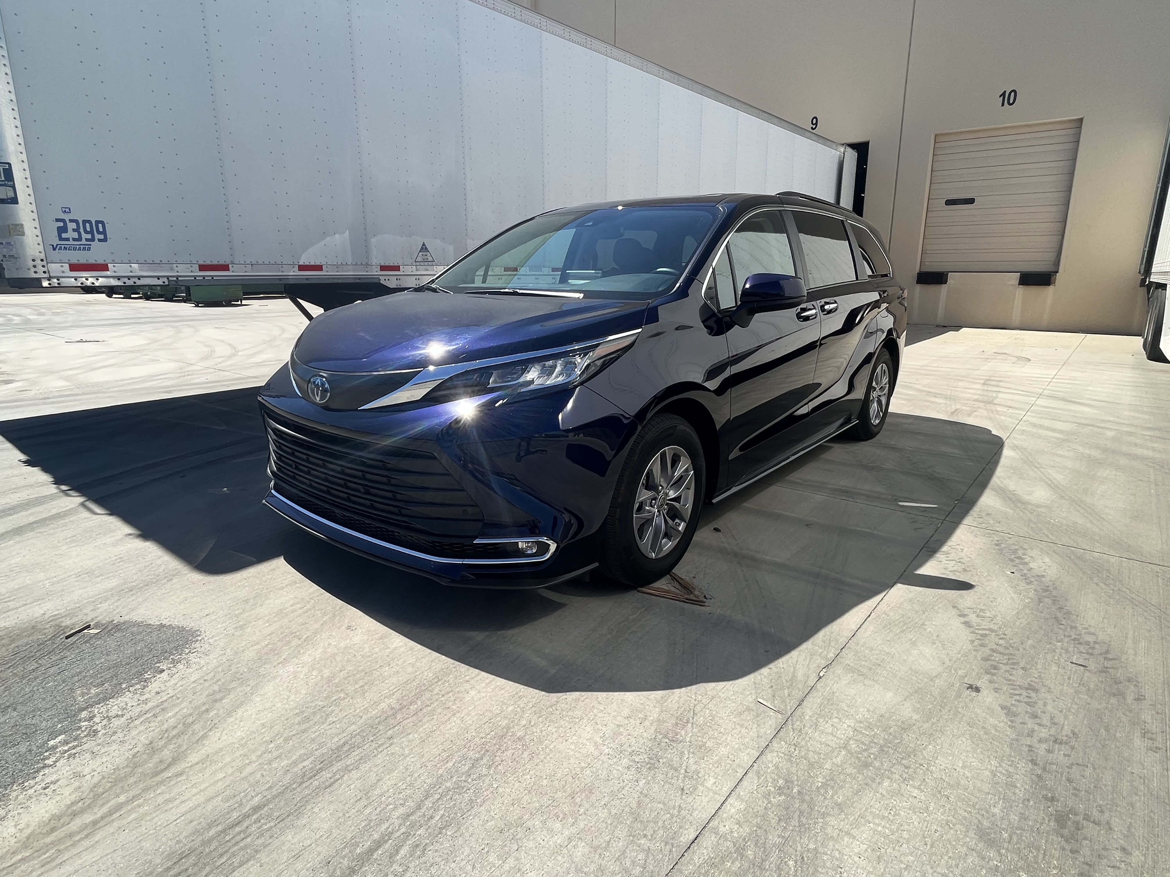 front left of a dark blue 2022 Toyota Sienna
