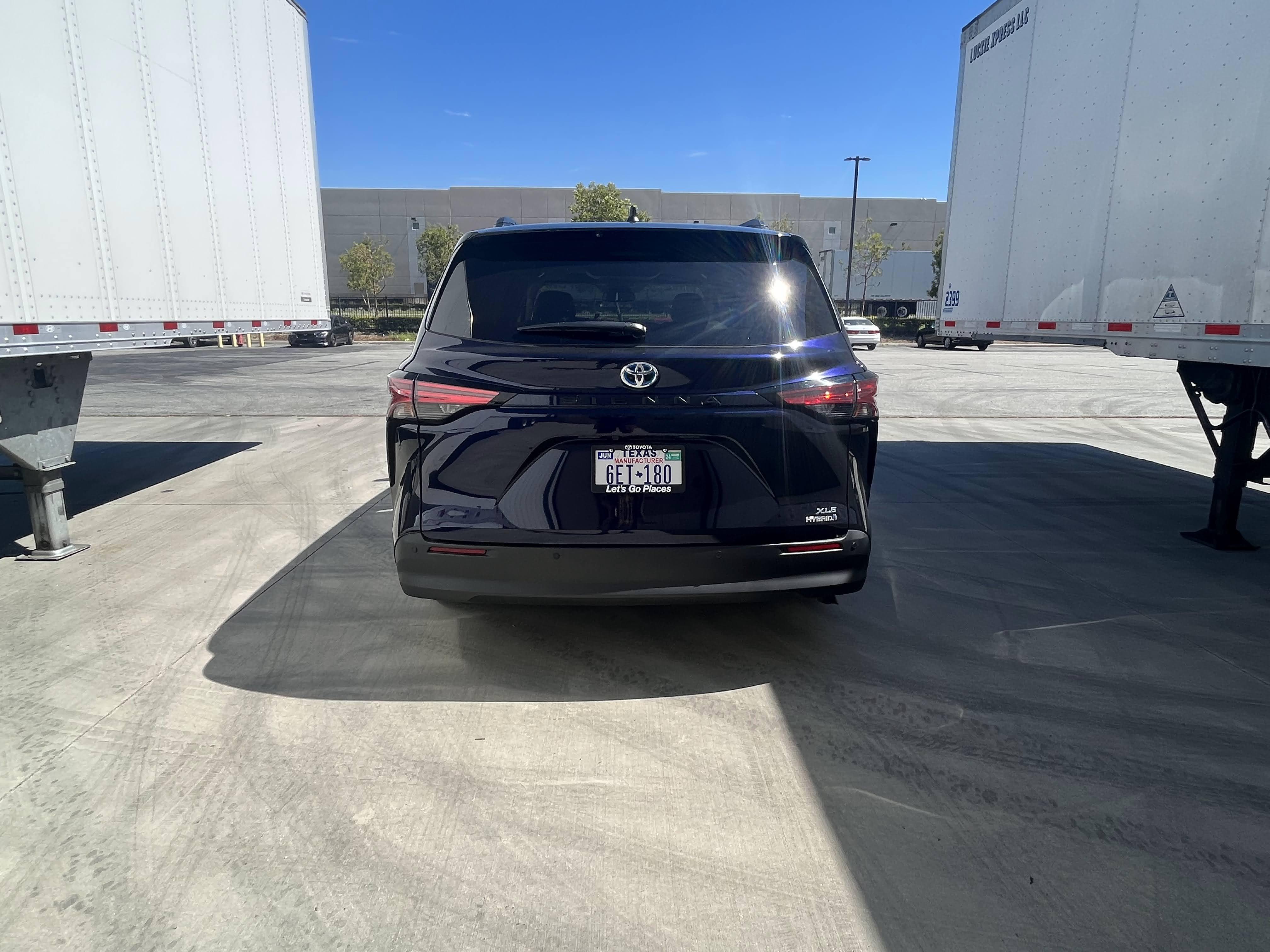 dark blue 2022 Toyota Sienna seen from behind