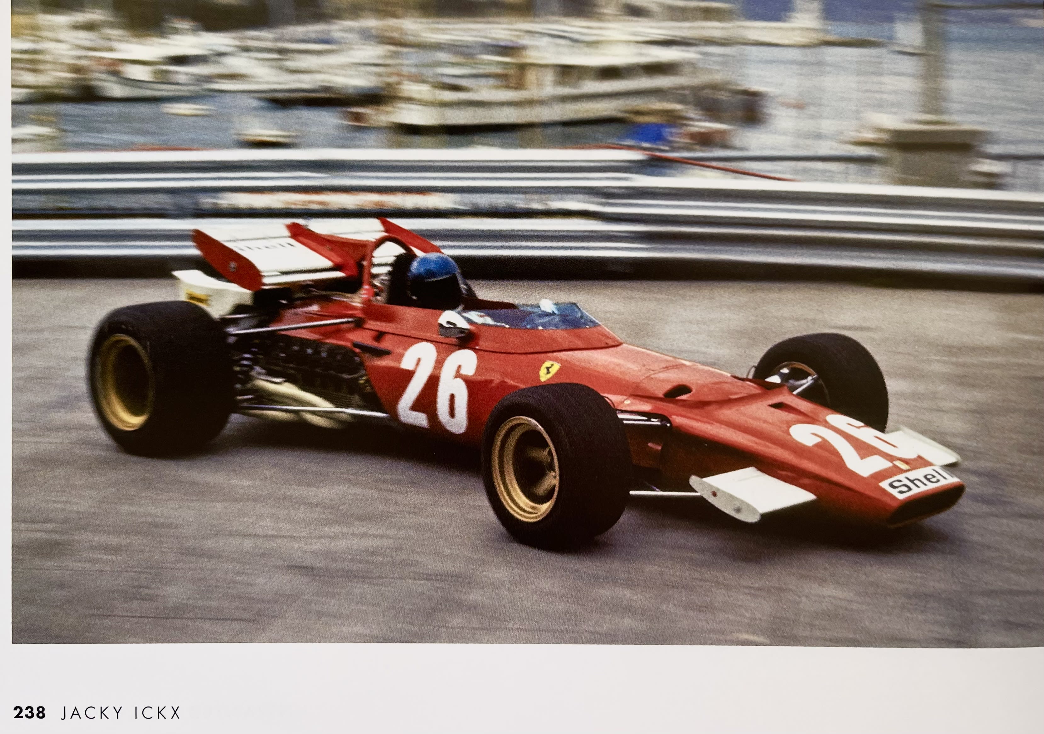 image from the book displaying Jacky Ickx in a red race car