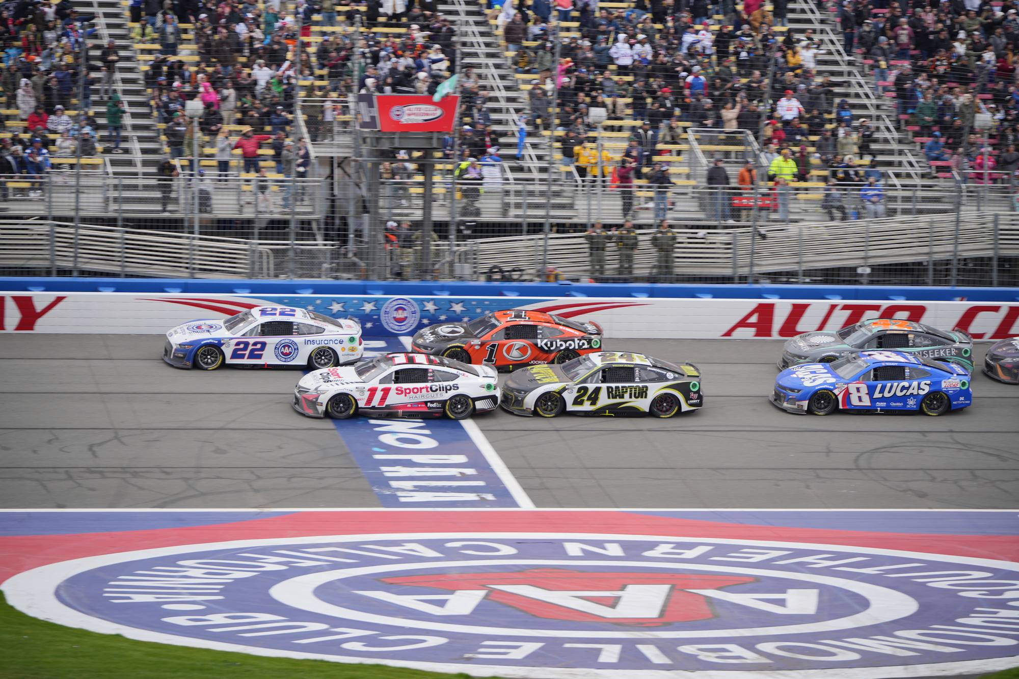 NASCAR race cars taking part in the final cup race to be held at the Auto Club Speedway in Fontana