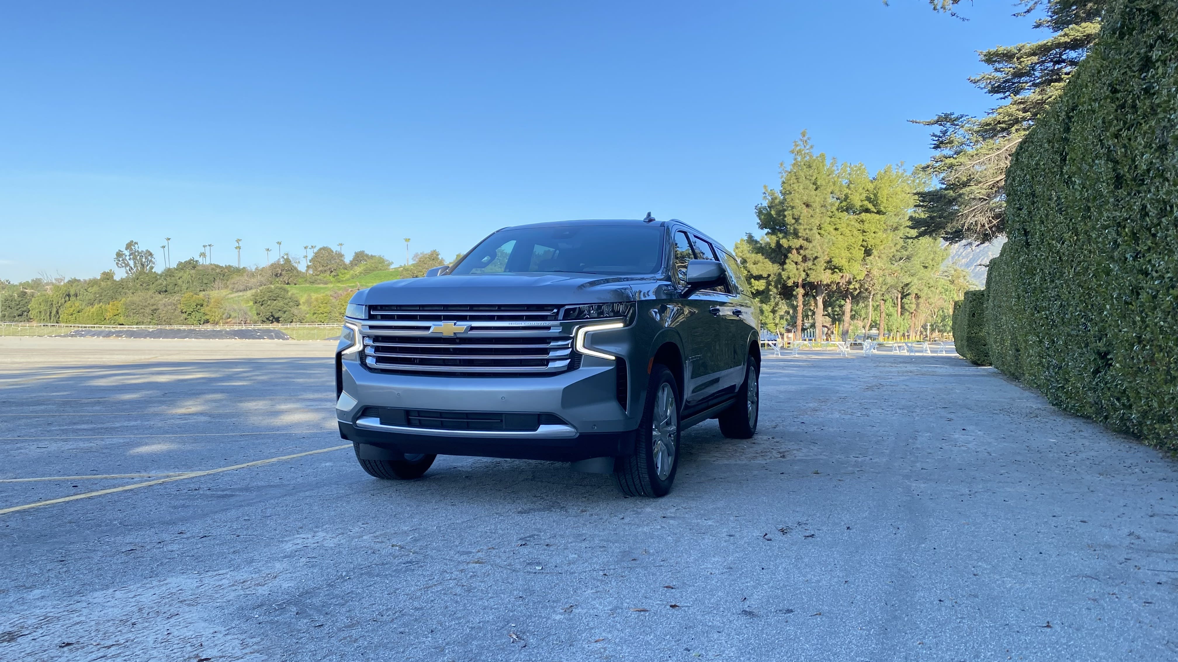 the 2023 Chevrolet Suburban High Country parked in an empty lot