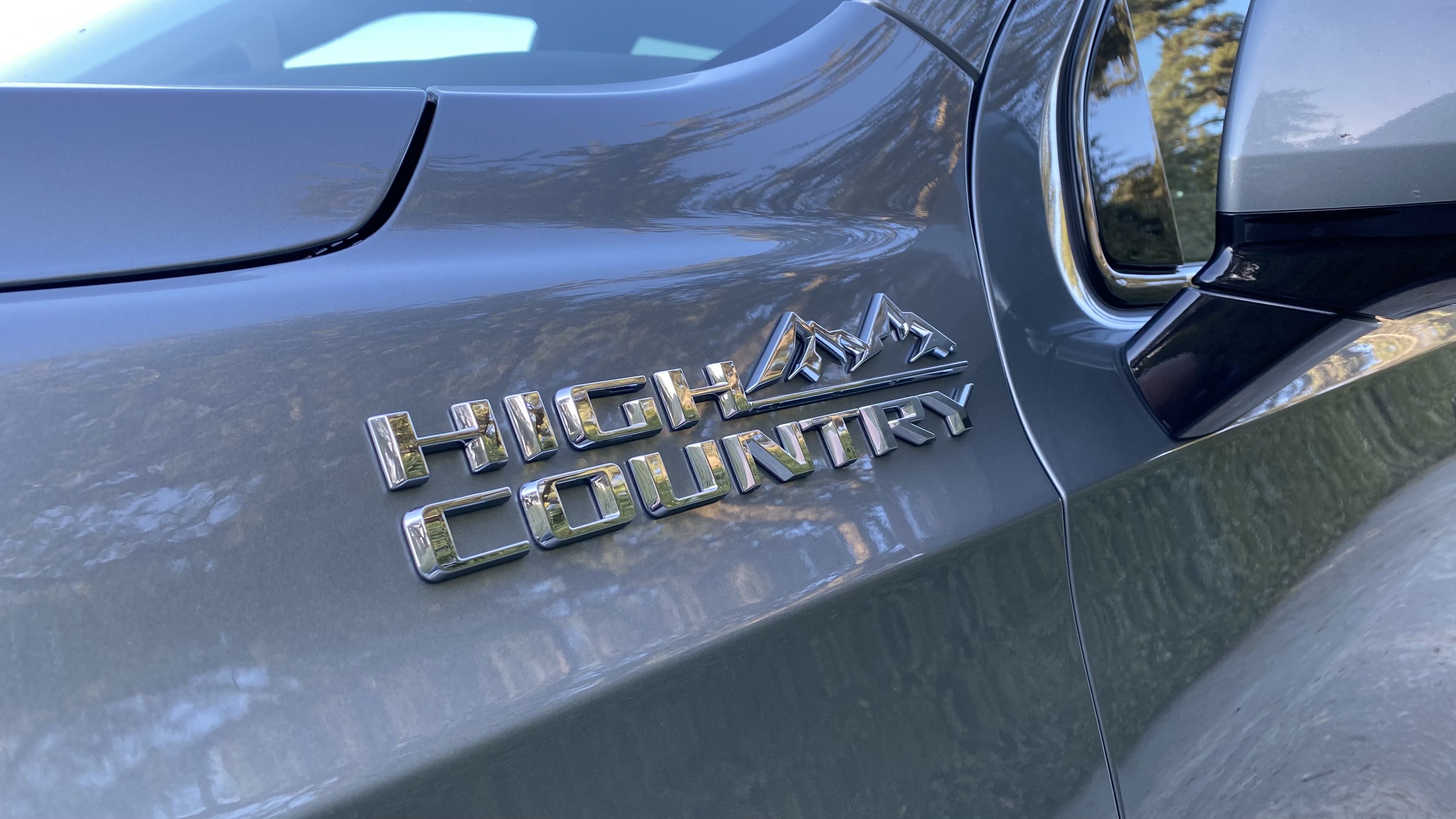closeup image of the High Country badge on the 2023 Chevrolet Suburban