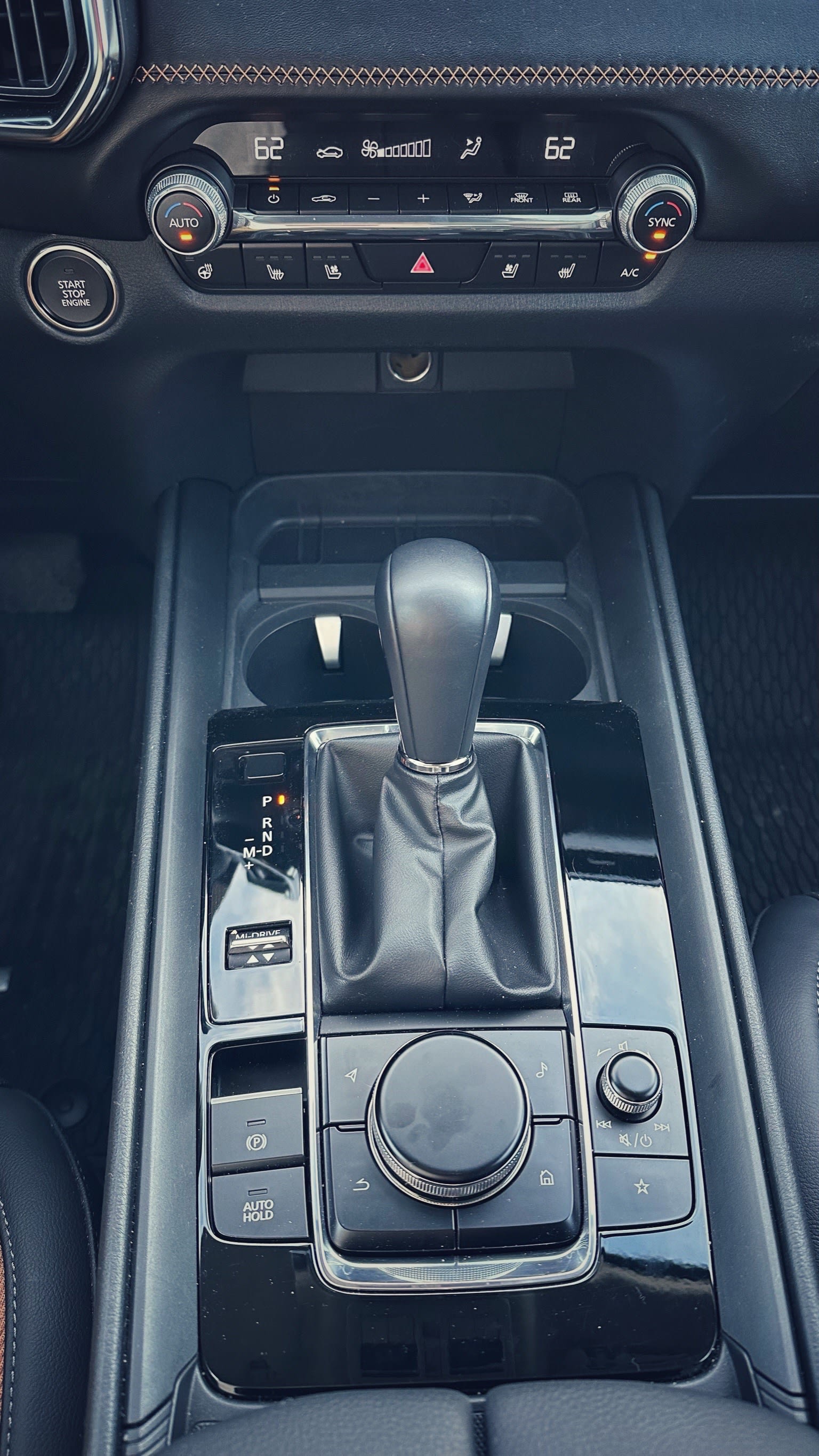 interior image of the 2023 Mazda CX-50 featuring the center console