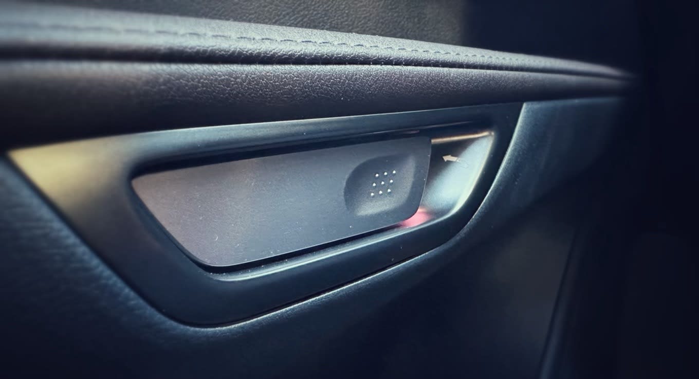 closeup image of the interior door handle of the 2023 Lexus RX350h