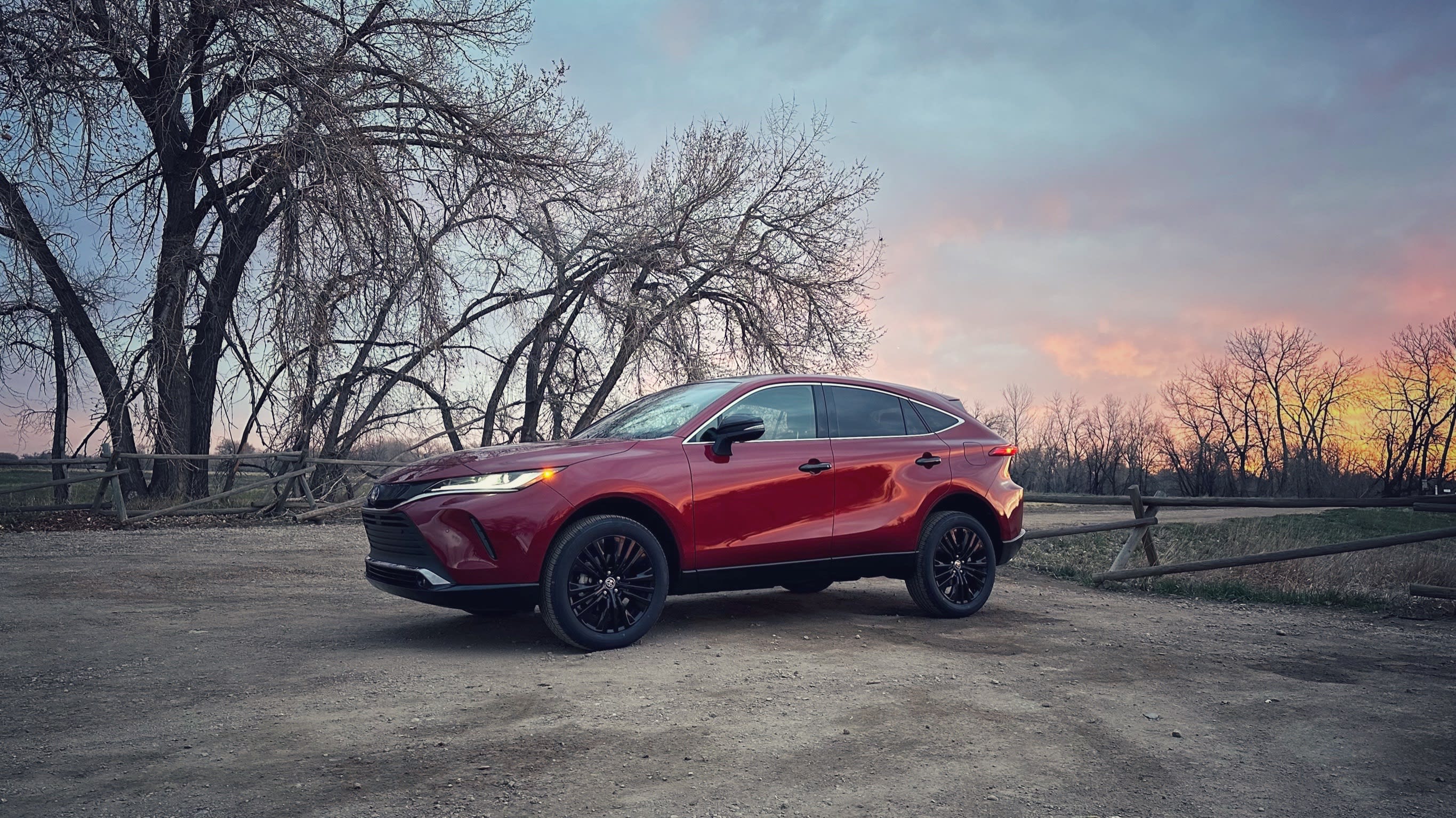 exterior of the 2023 Toyota Venza, with a sunrise in the background.