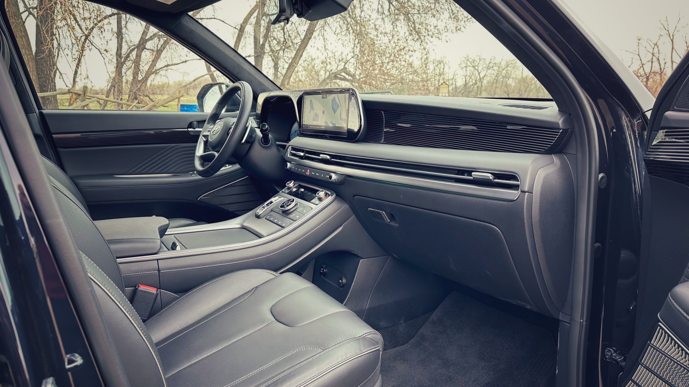 view of the interior of the 2023 Hyundai Palisade Calligraphy, as seen from the passenger side