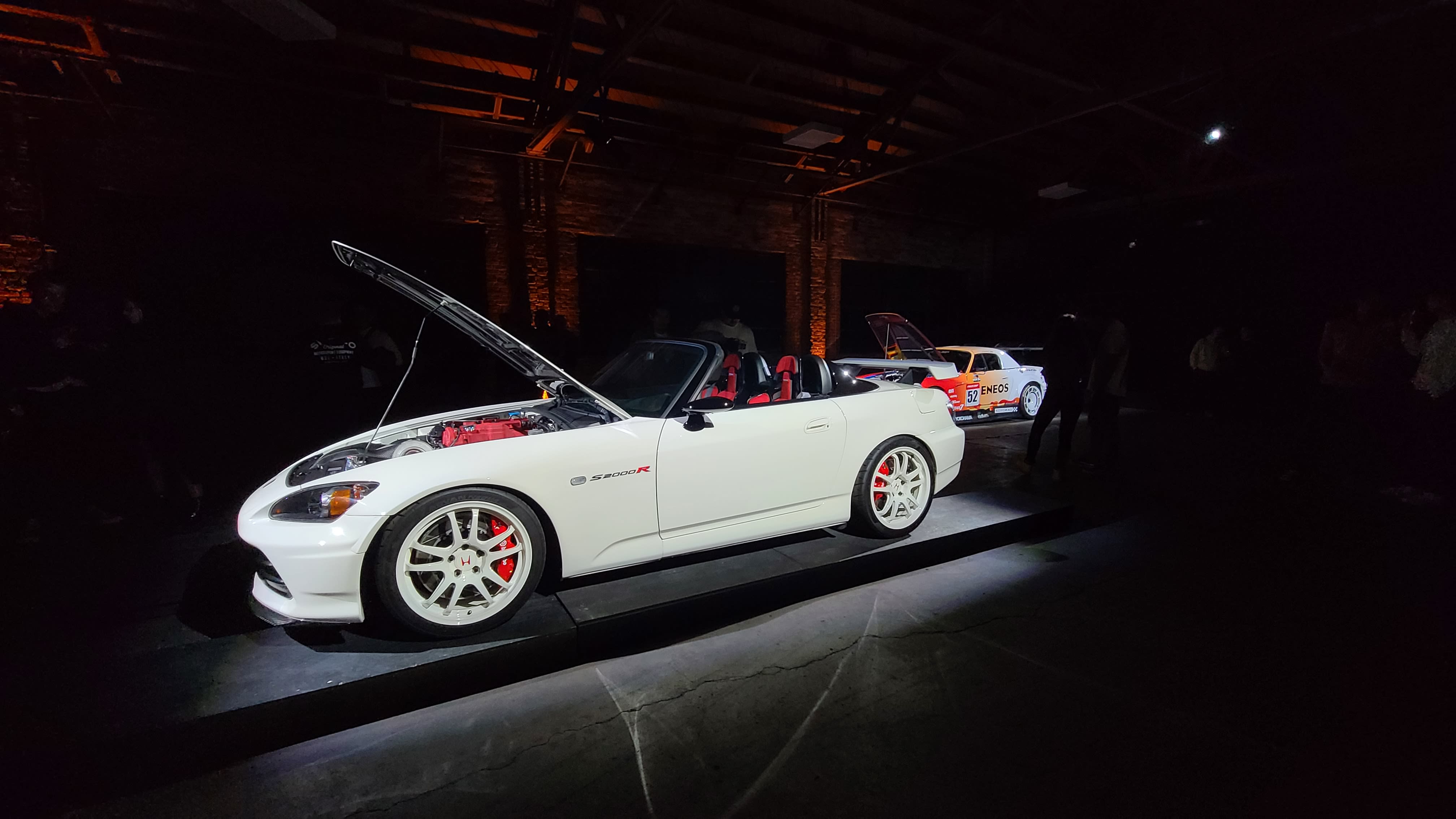 white S2000 with its hood open at the event