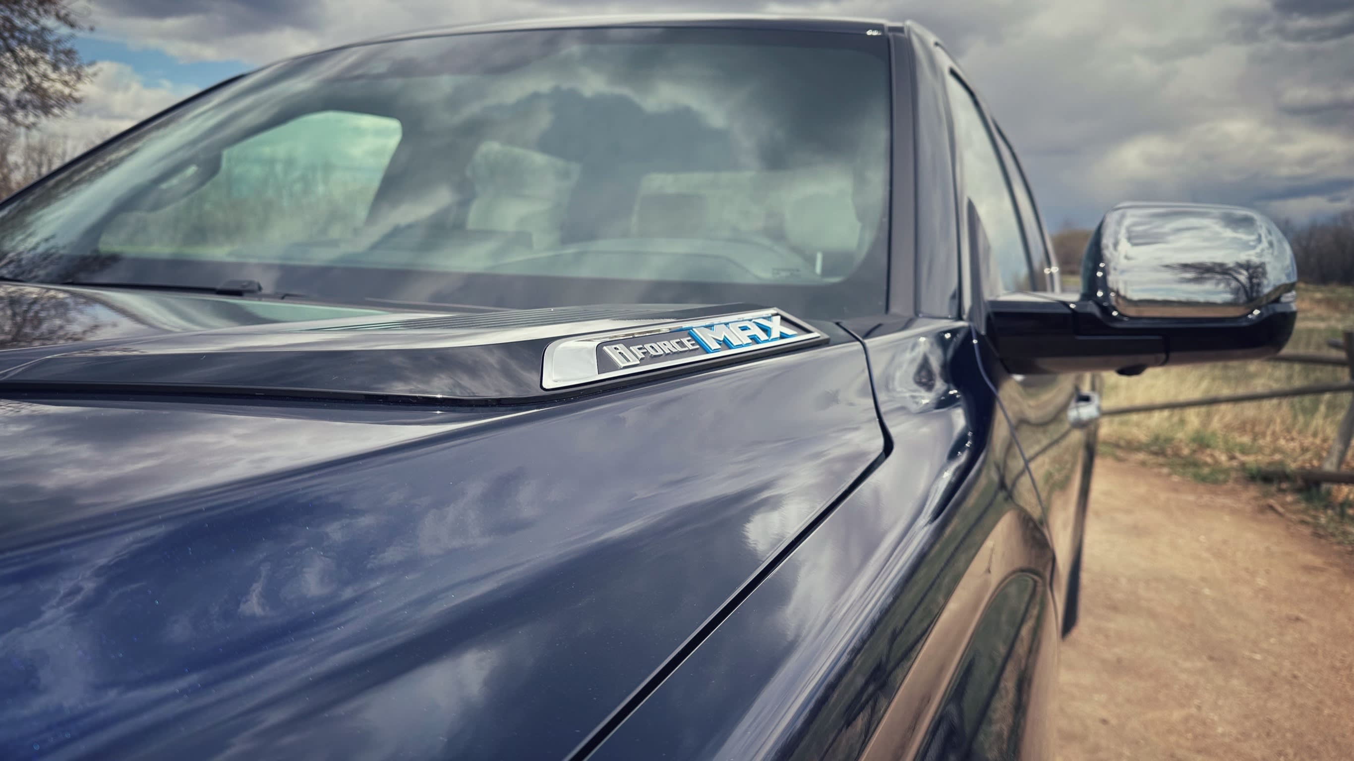 detail photo of the i-FORCE MAX badging on the hood of the 2023 Toyota Tundra