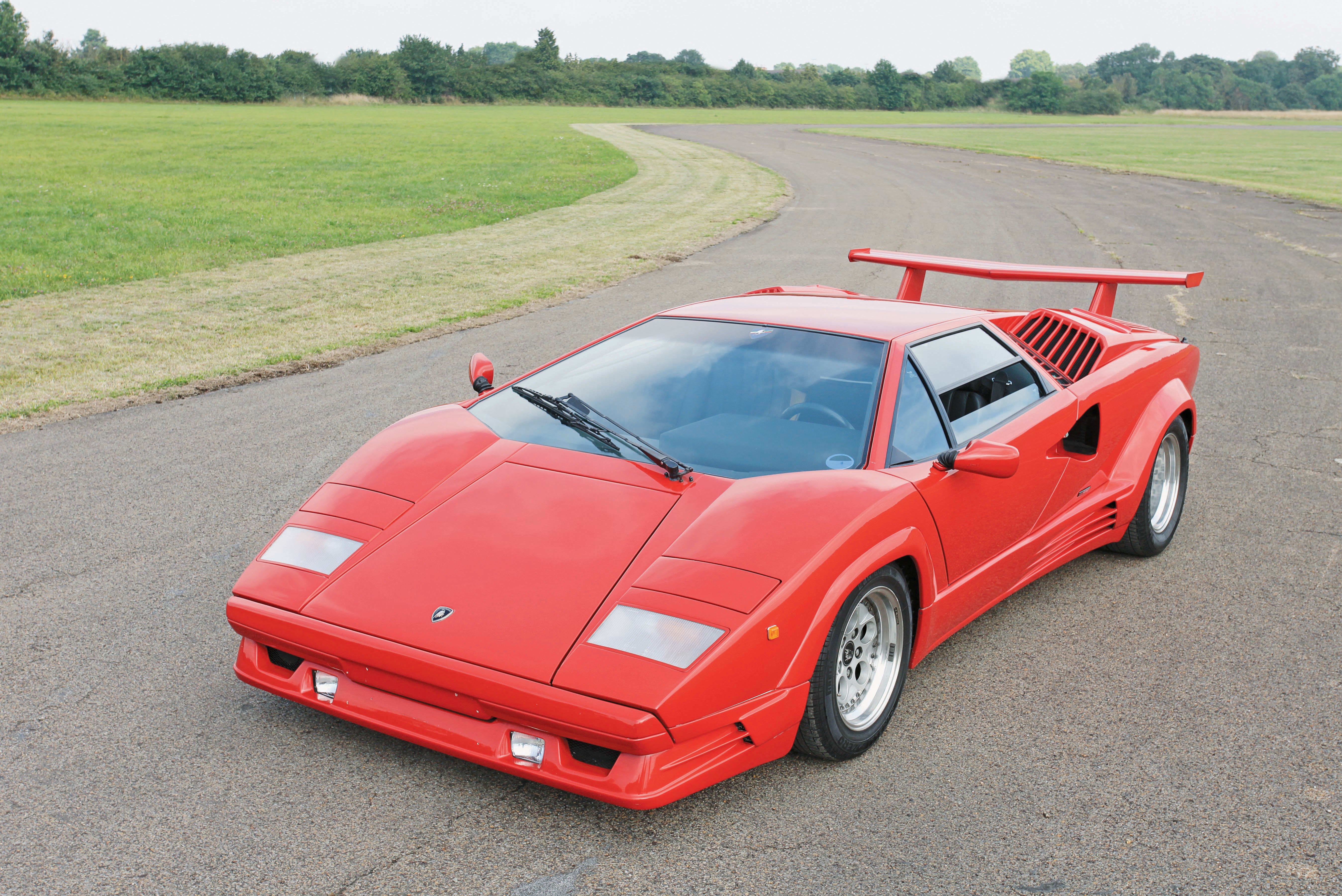 a red, classic old, Lamborghini