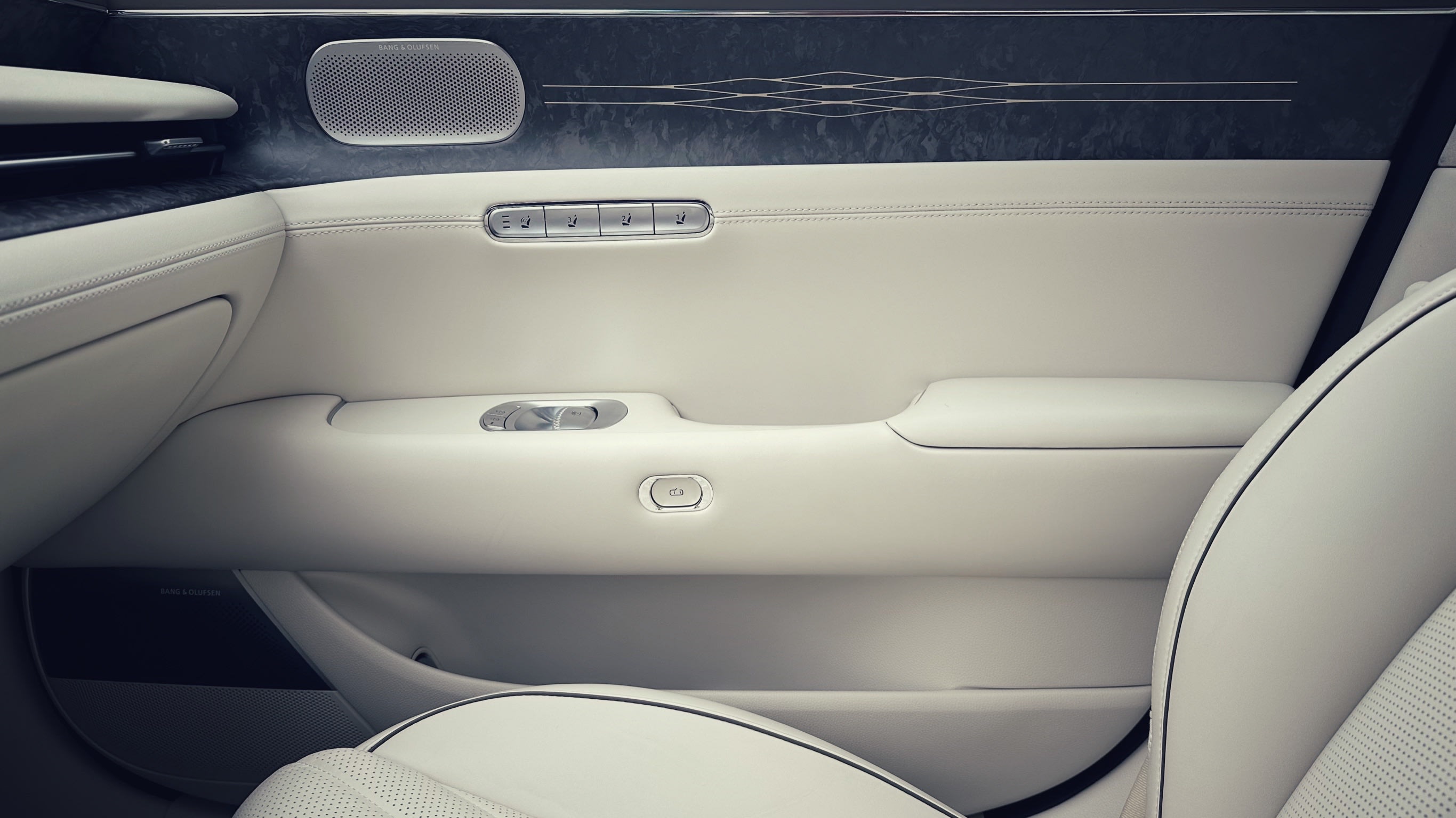 interior of the Genesis G90 showcasing the inside of the door