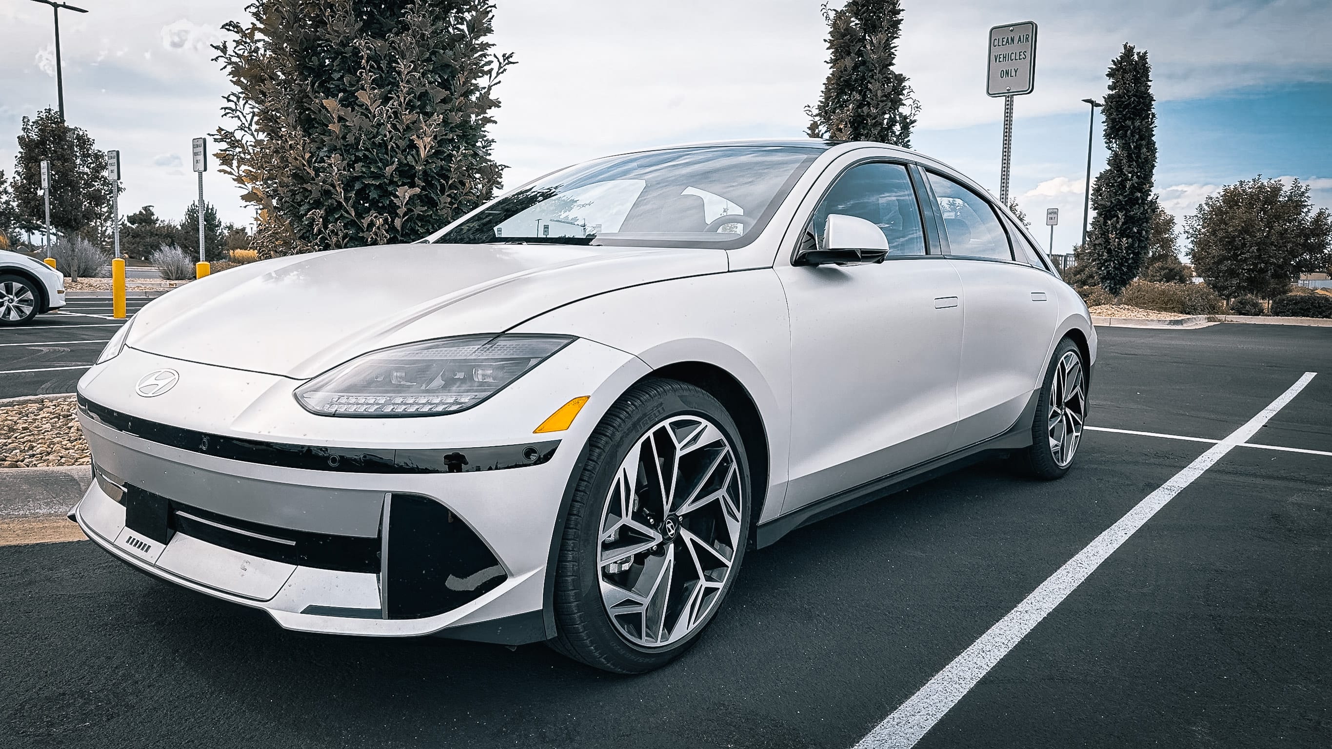 a matte gray 2023 Hyundai Ioniq 6 parked on a spot for EVs