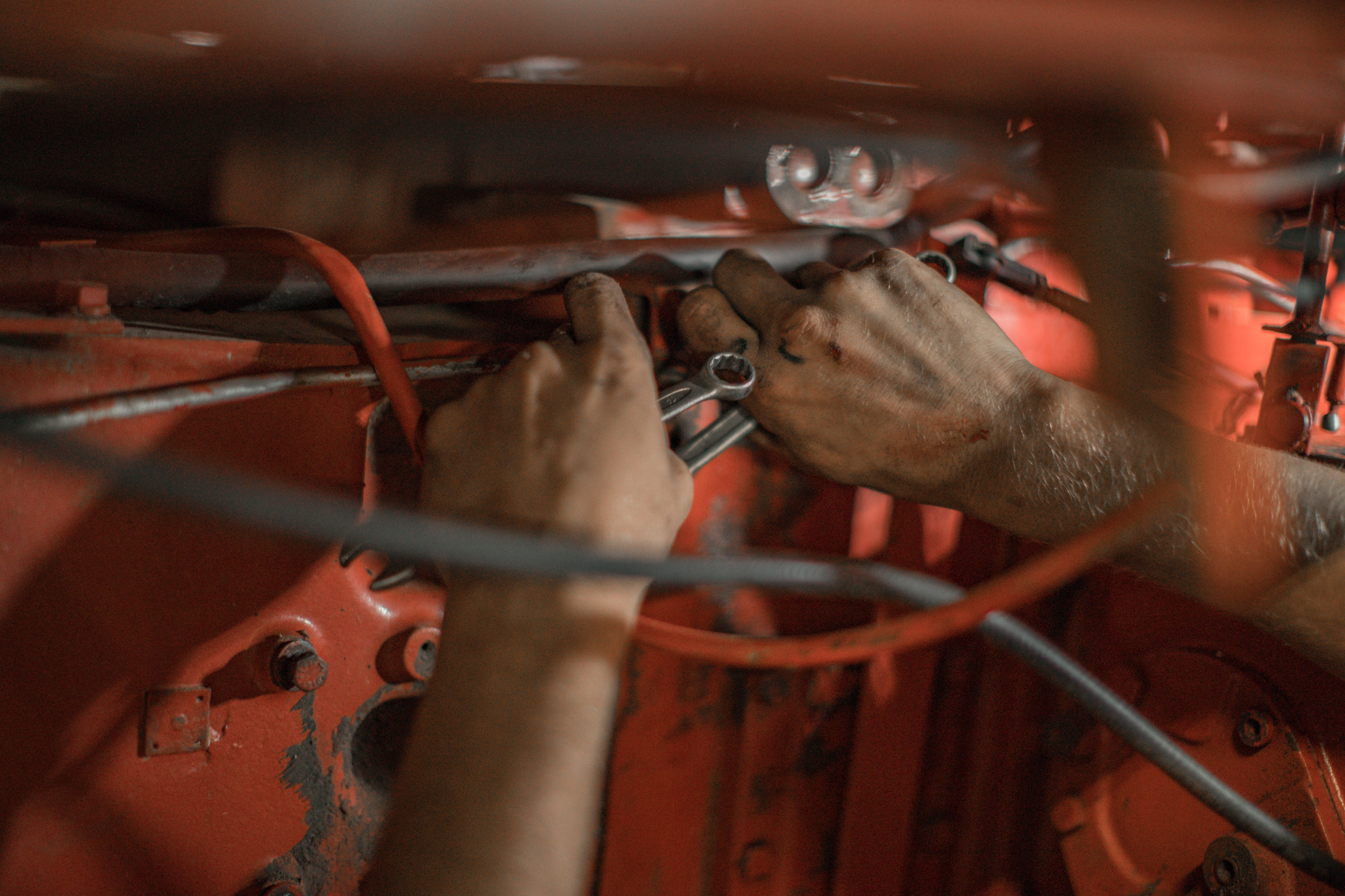 image of a person working on something on a car