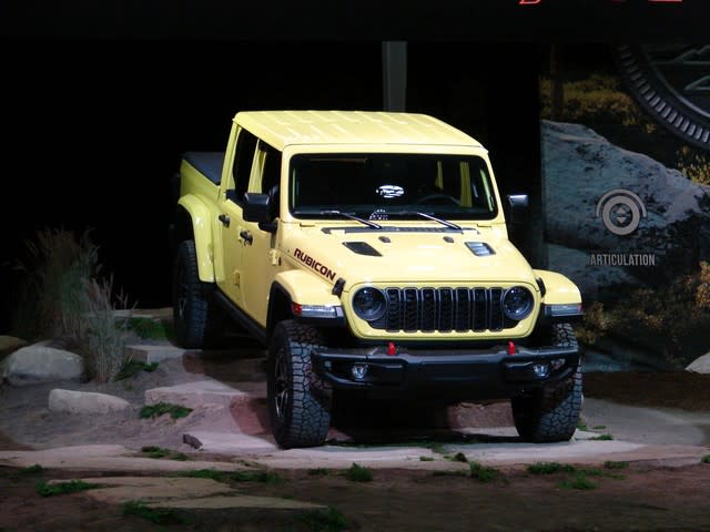 a light yellow Jeep Rubicon on display at the 2023 NAIAS