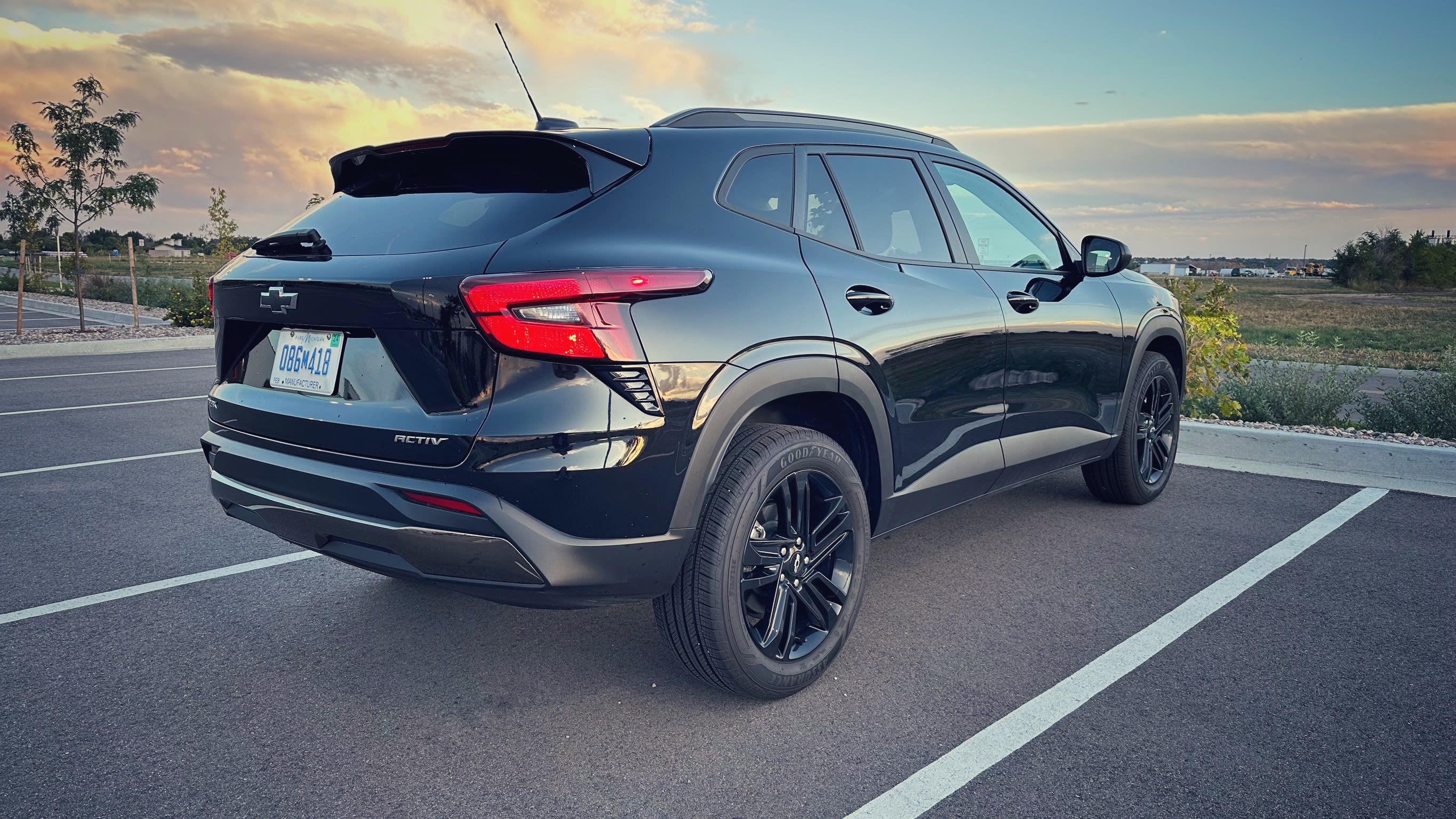 rear and side of a black 2024 Chevrolet Trax