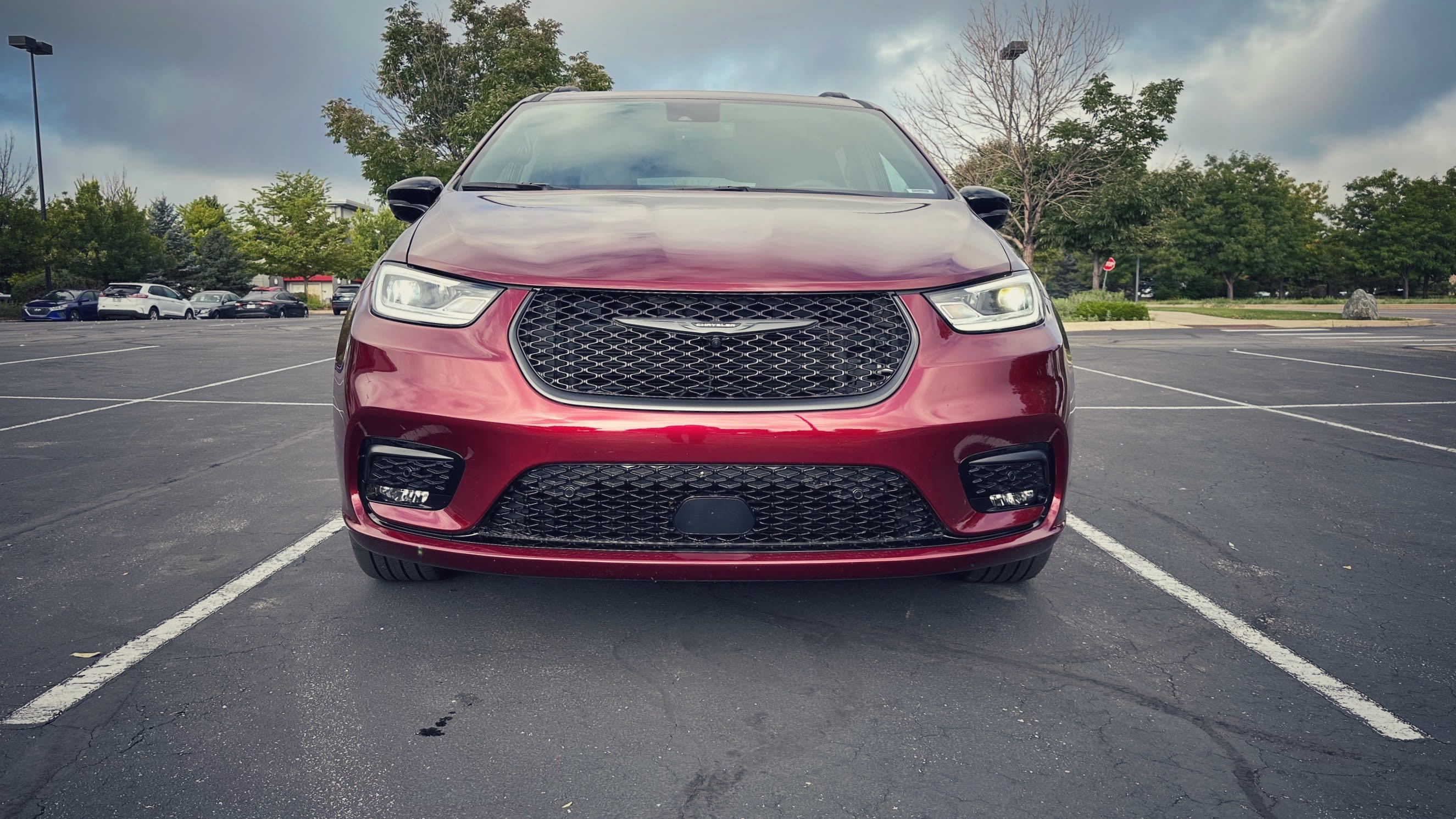 front exterior of a red 2023 Chrysler Pacifica