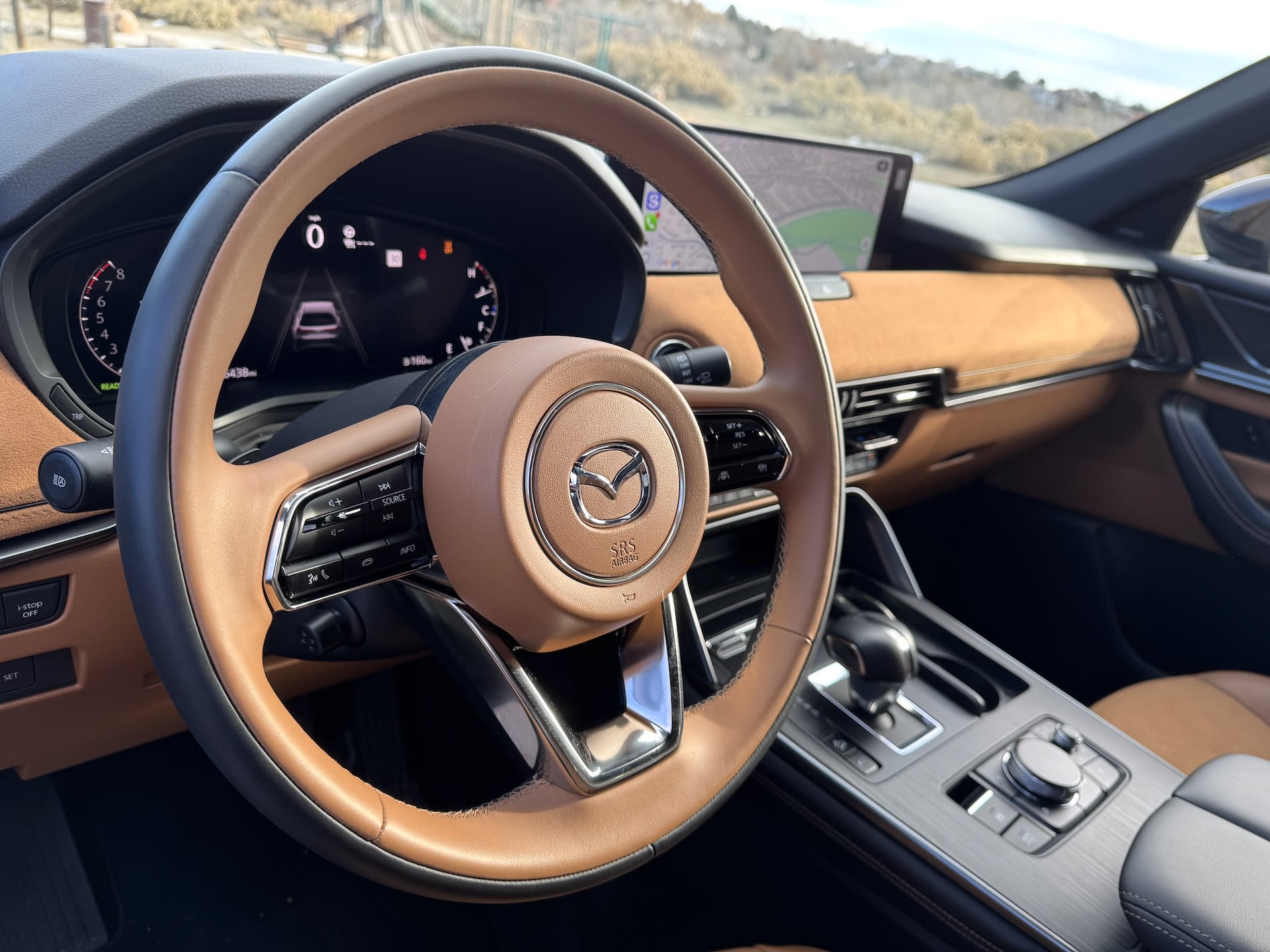 Interior of the 2025 Mazda CX-70 with brown leather