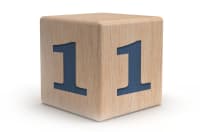 Wooden block with numeral one.