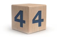 Wooden block with numeral four.