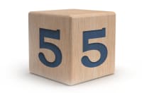 Wooden block with numeral five.