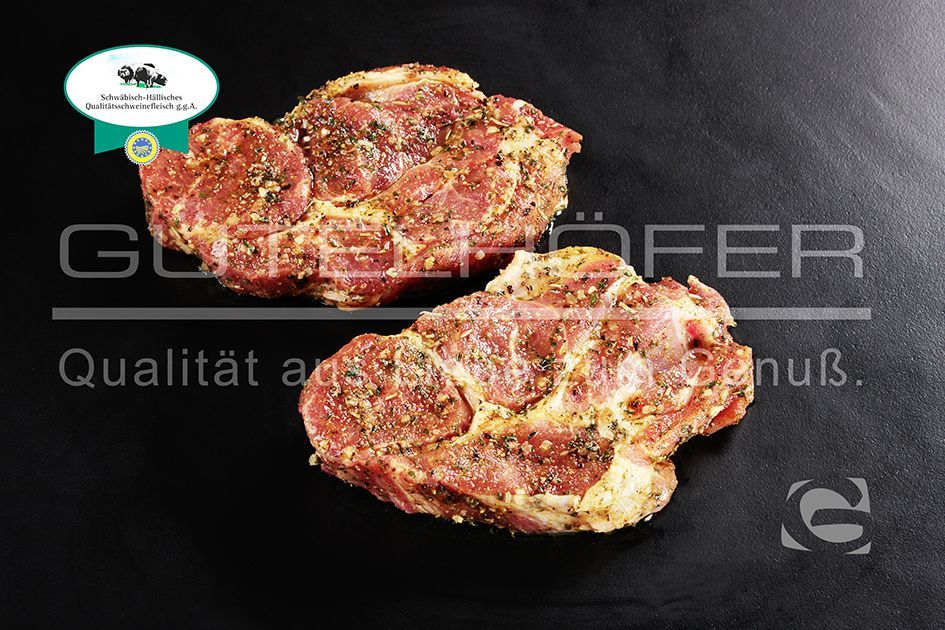 Bild zu '2 Stück Schwenksteak Nacken vom hällischen Weideschwein in Kräuter Marinade, je 200g '