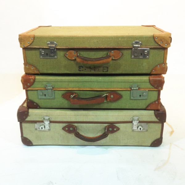 1: Stack Of 3 Green Vintage Canvas Suitcases