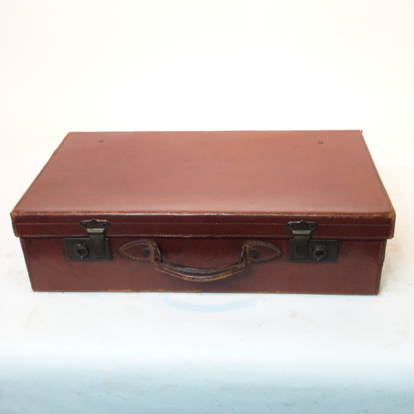 1: Brown Leather Suitcase