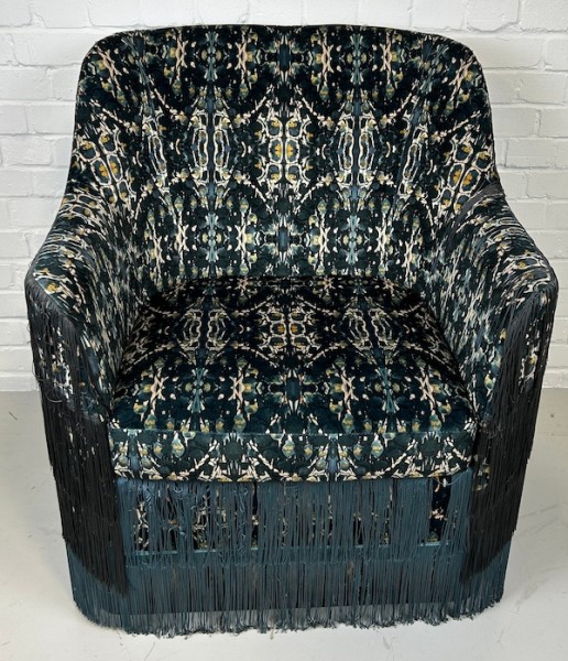 1: Stylish Fringed Chair