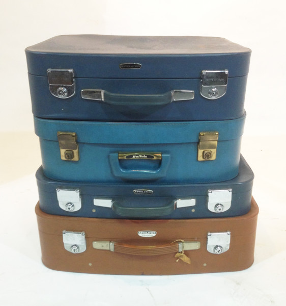 1: Stack of Different Coloured Retro Soft Leather Suitcases 